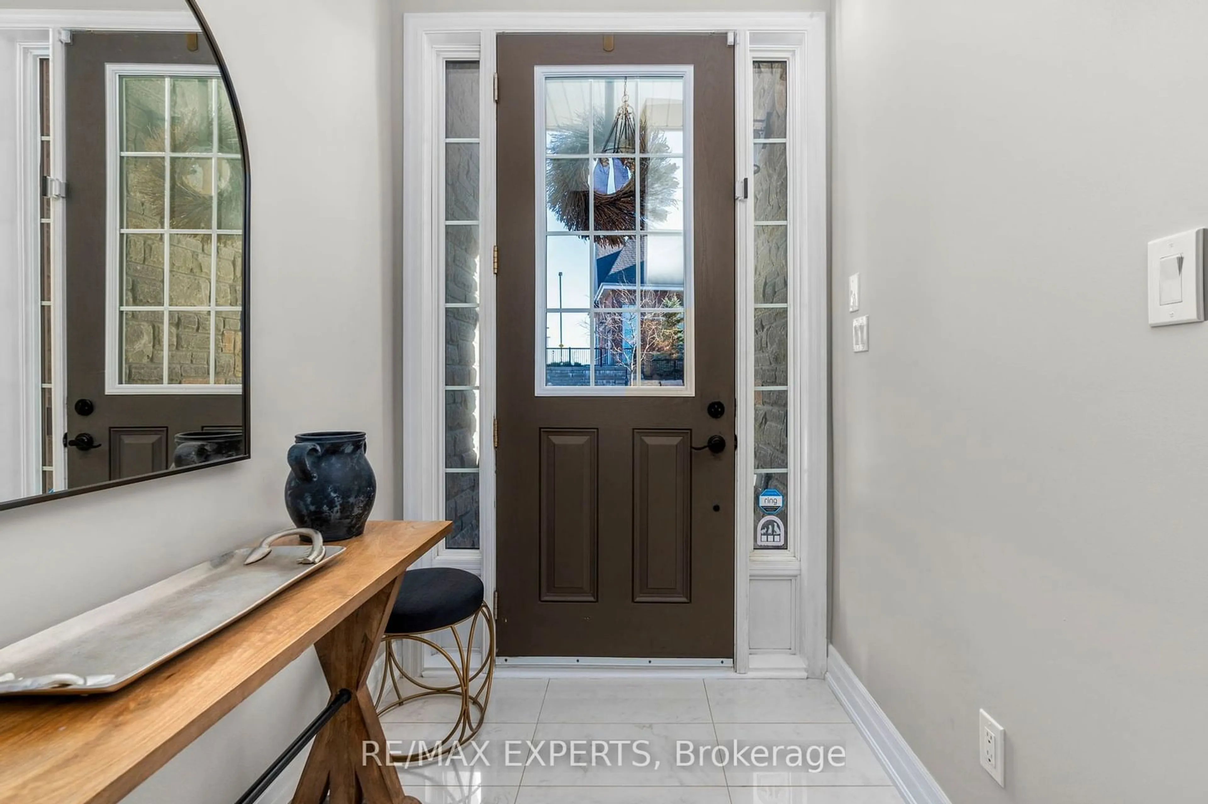 Indoor entryway, wood floors for 42 Wells Orchard Cres, King Ontario L7B 0C6