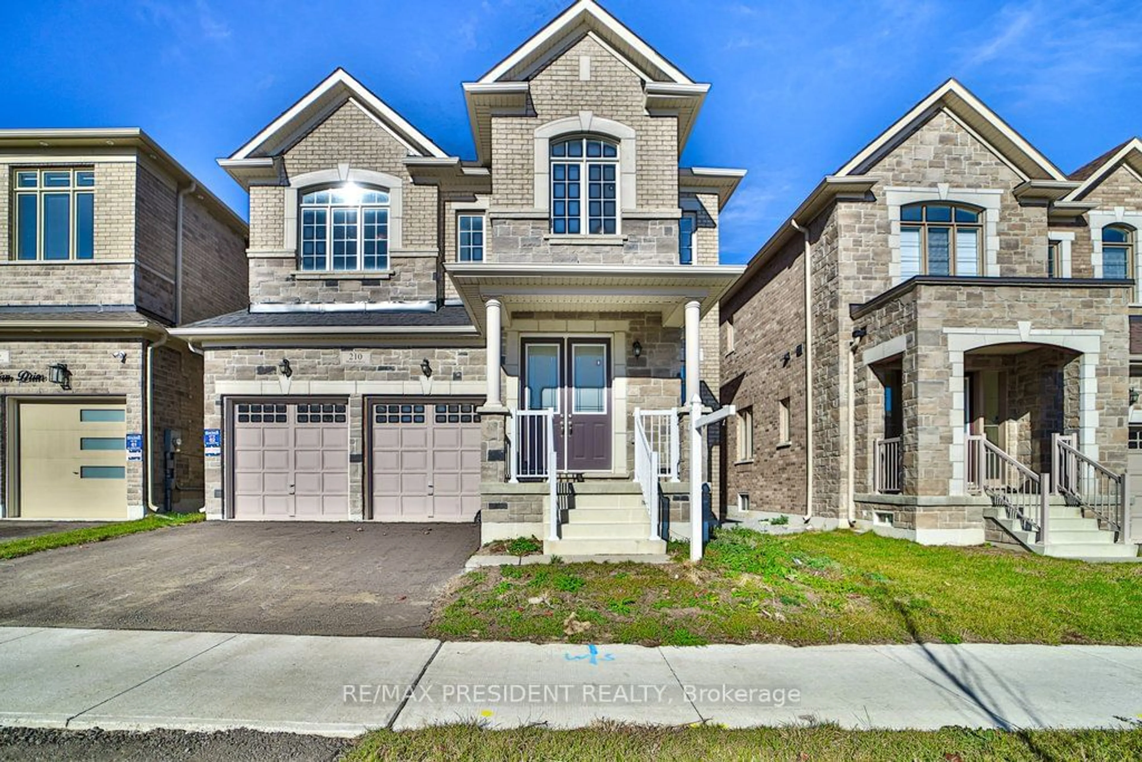 A pic from exterior of the house or condo, the street view for 210 Mckean Dr, Whitchurch-Stouffville Ontario L4A 5C2