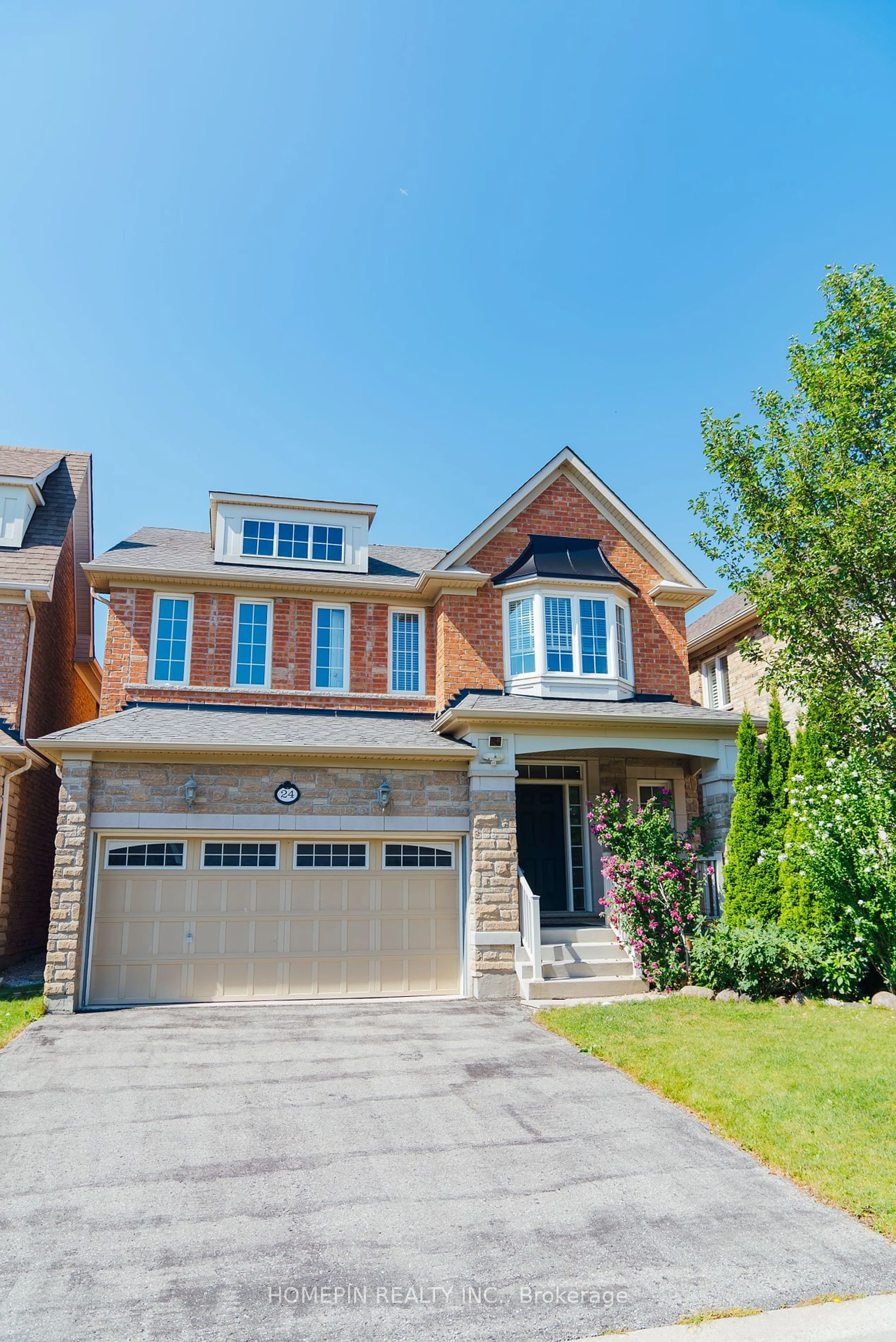 Home with brick exterior material for 24 James Joyce Dr, Markham Ontario L6C 0L7