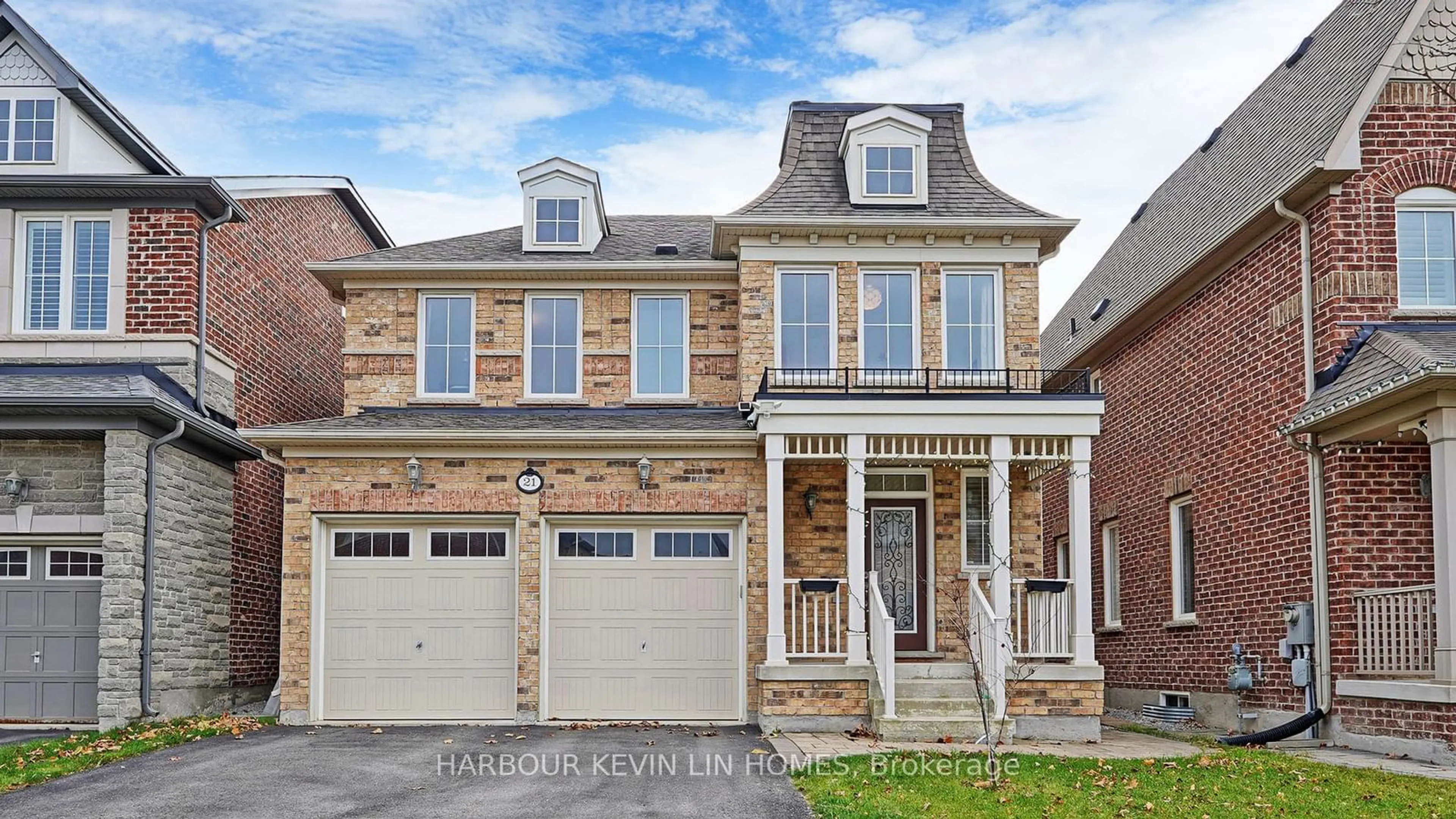 Home with brick exterior material for 21 Freesia Rd, Markham Ontario L6C 0L7