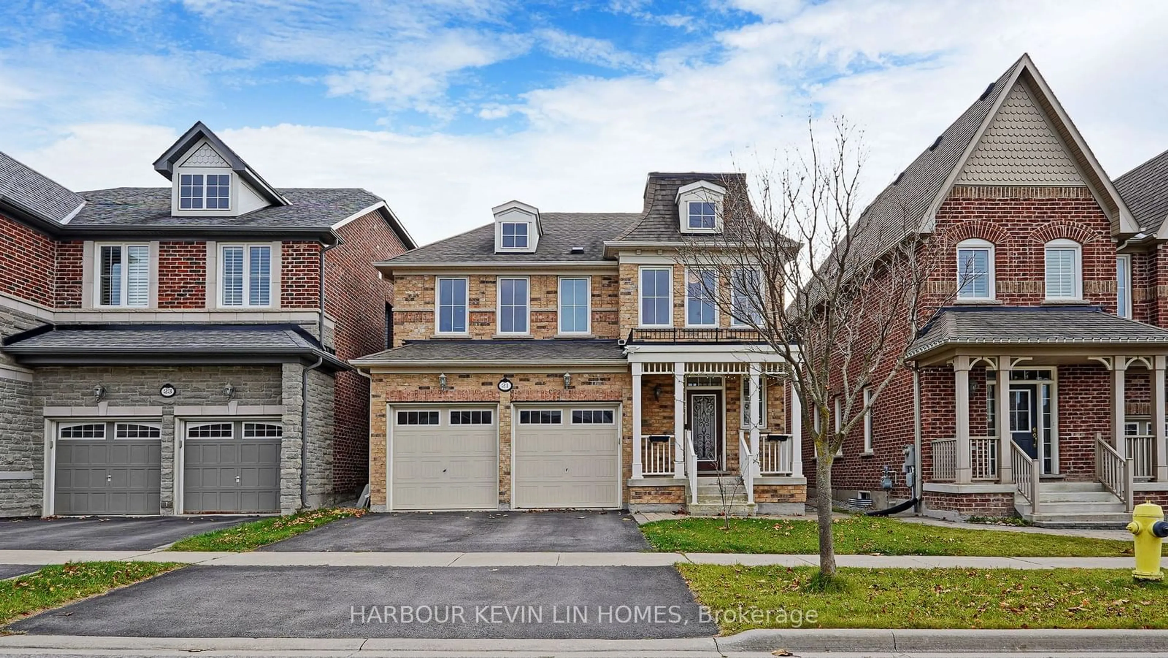 Home with brick exterior material for 21 Freesia Rd, Markham Ontario L6C 0L7