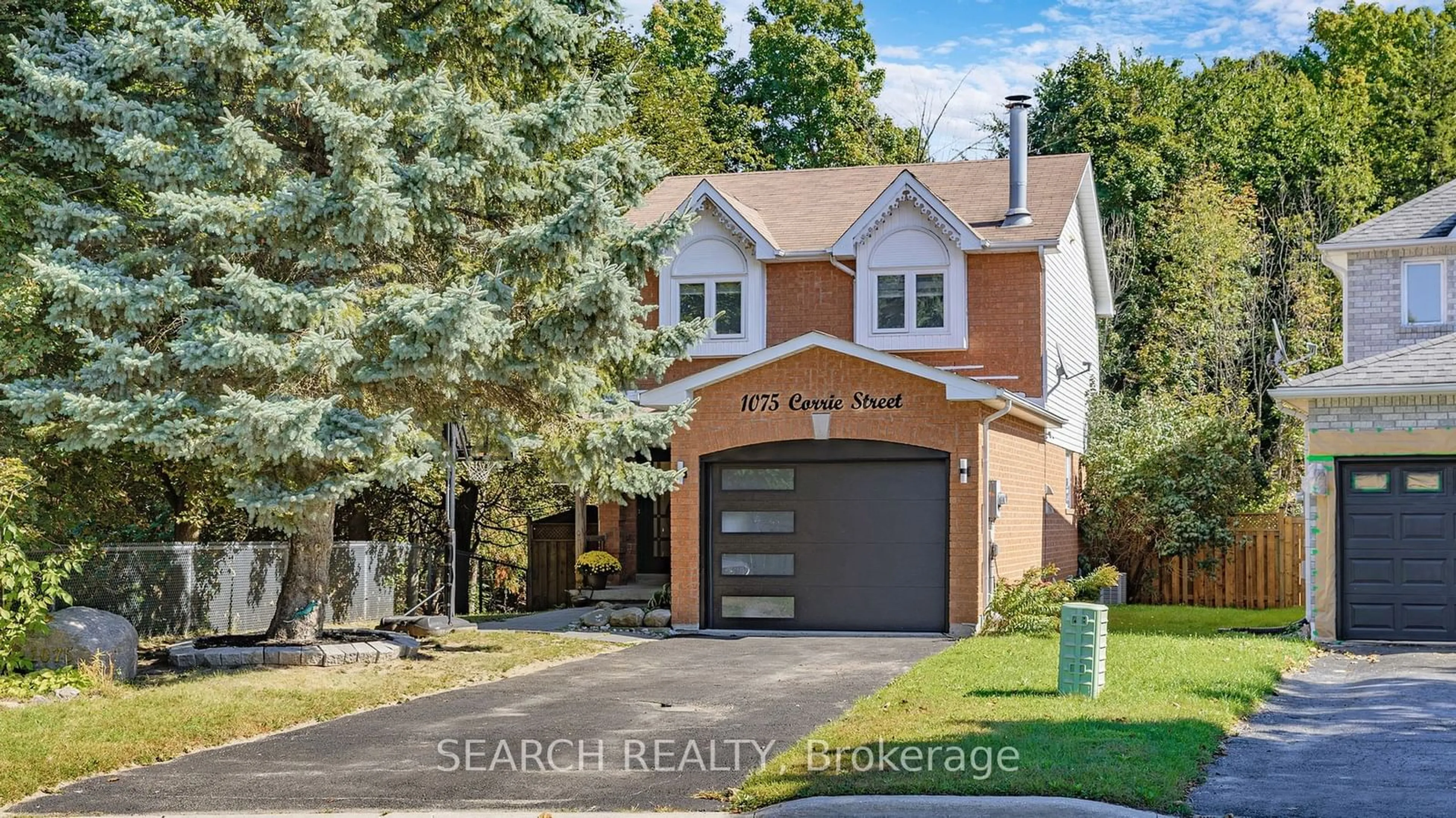 Frontside or backside of a home, the street view for 1075 Corrie St, Innisfil Ontario L9S 1T7