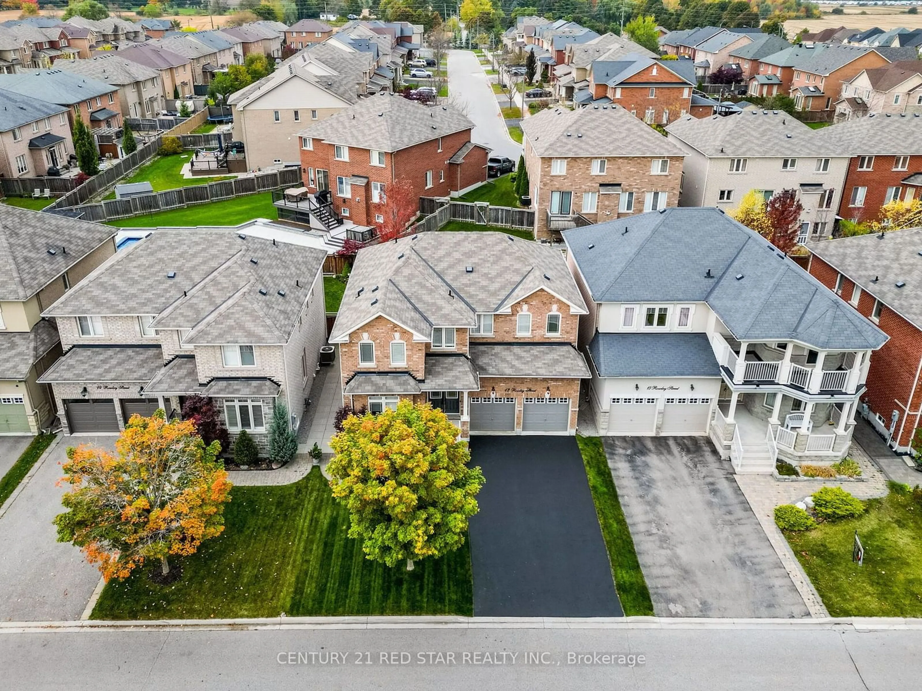 Frontside or backside of a home, the street view for 12 Rowley St, Richmond Hill Ontario L4E 0N2