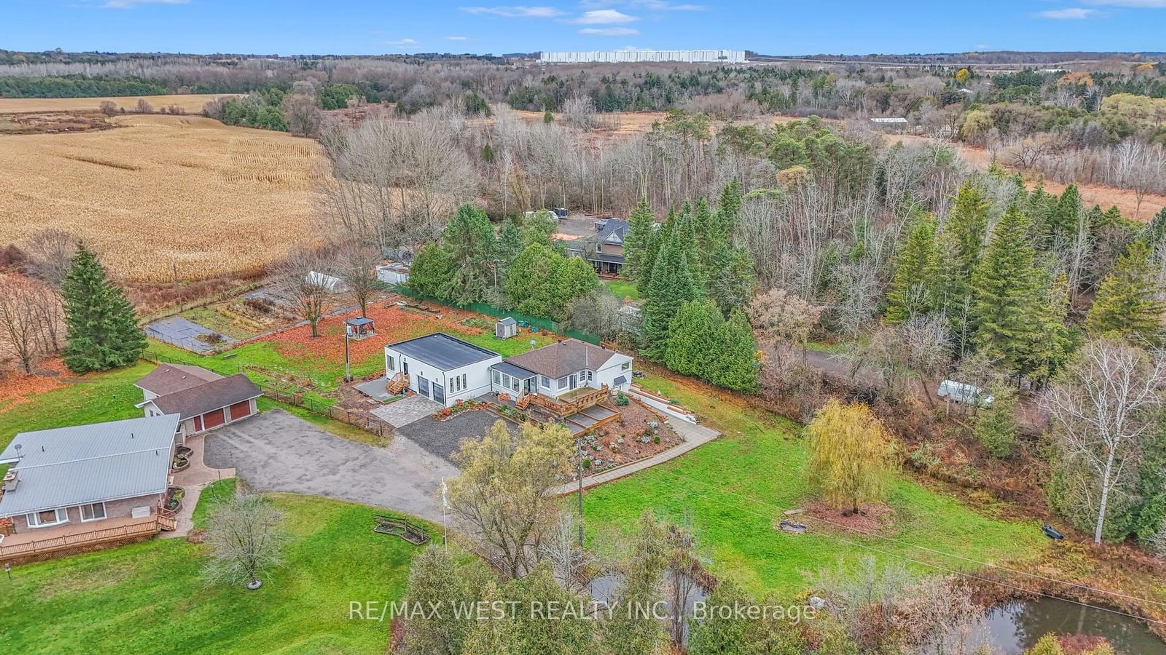 A pic from exterior of the house or condo, the fenced backyard for 2821 Mt Albert Rd, East Gwillimbury Ontario L0G 1R0