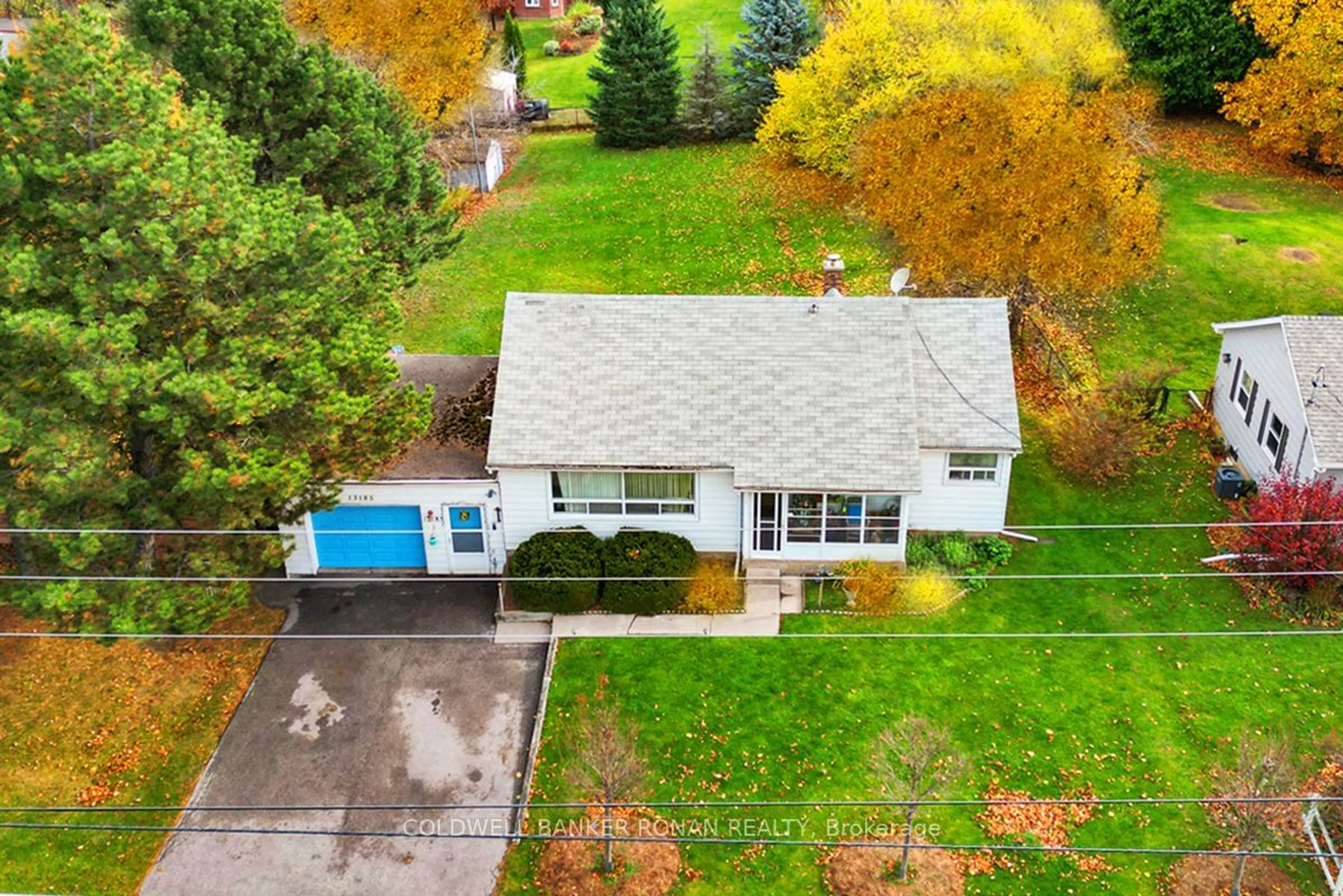 Frontside or backside of a home, the fenced backyard for 13185 Highway 27, King Ontario L0G 1T0