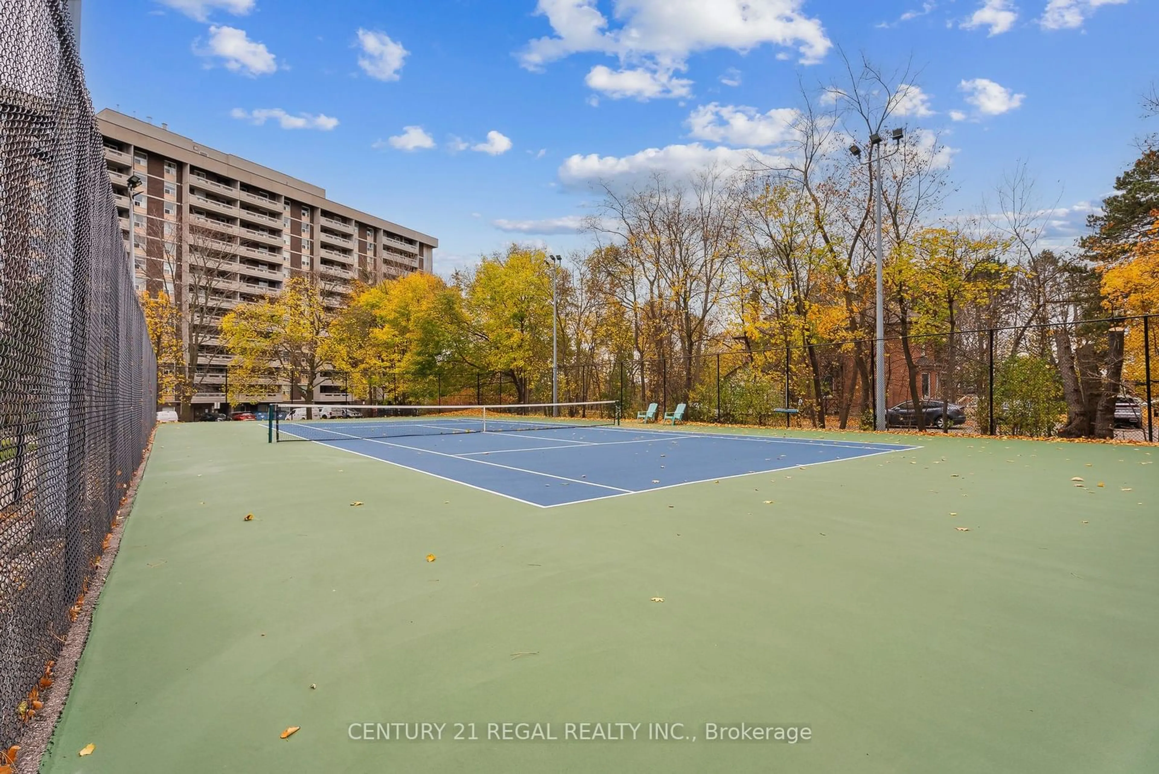 A pic from exterior of the house or condo, the fenced backyard for 1 Royal Orchard Blvd #703, Markham Ontario L3T 3C2