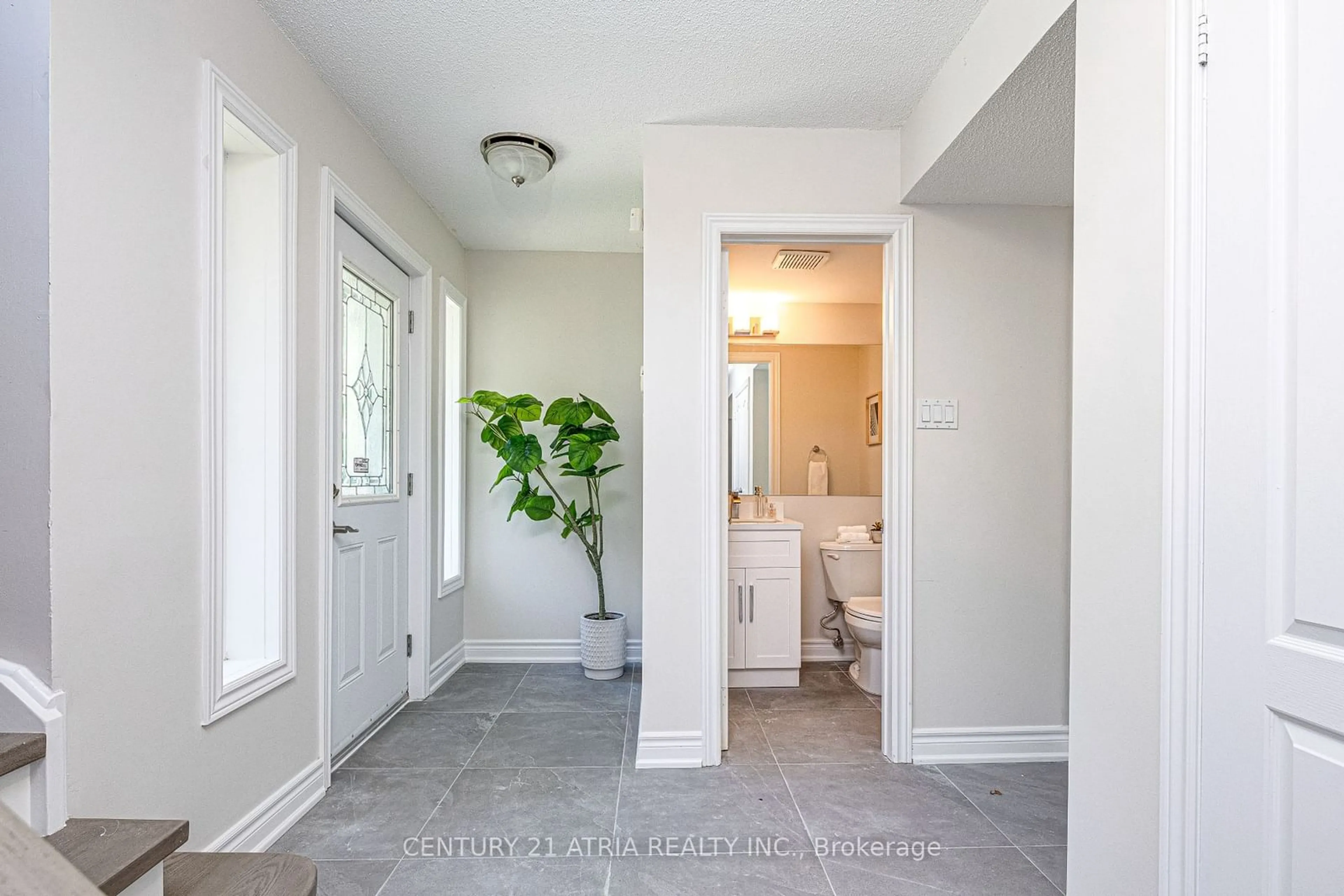 Indoor entryway, wood floors for 77 Leitchcroft Cres, Markham Ontario M3T 7T9