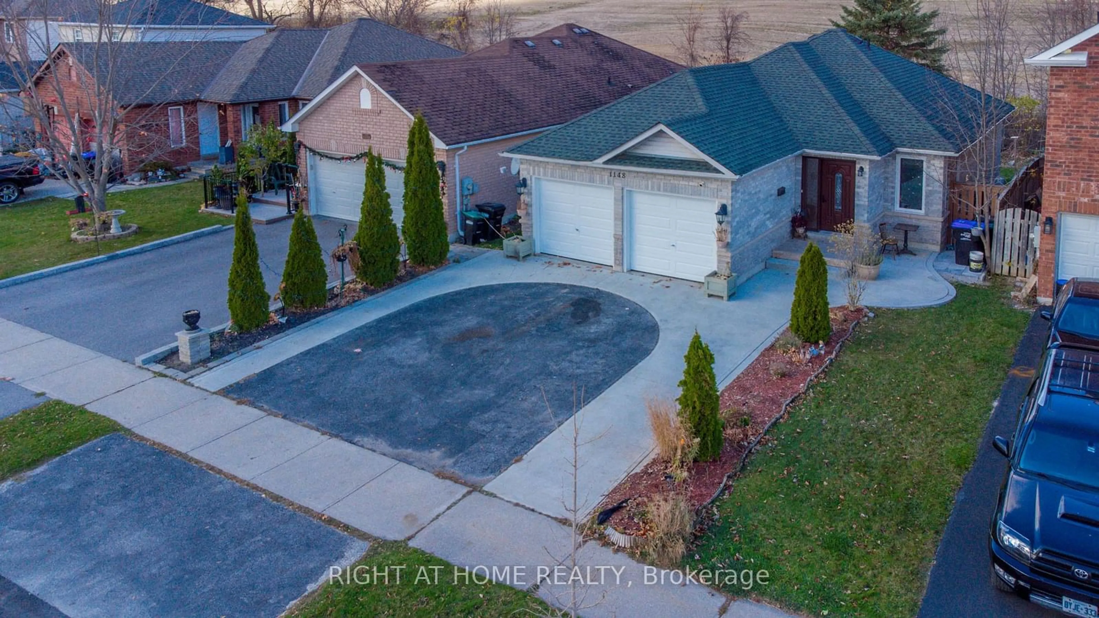 Frontside or backside of a home, the fenced backyard for 1148 Leslie Dr, Innisfil Ontario L9S 2A8