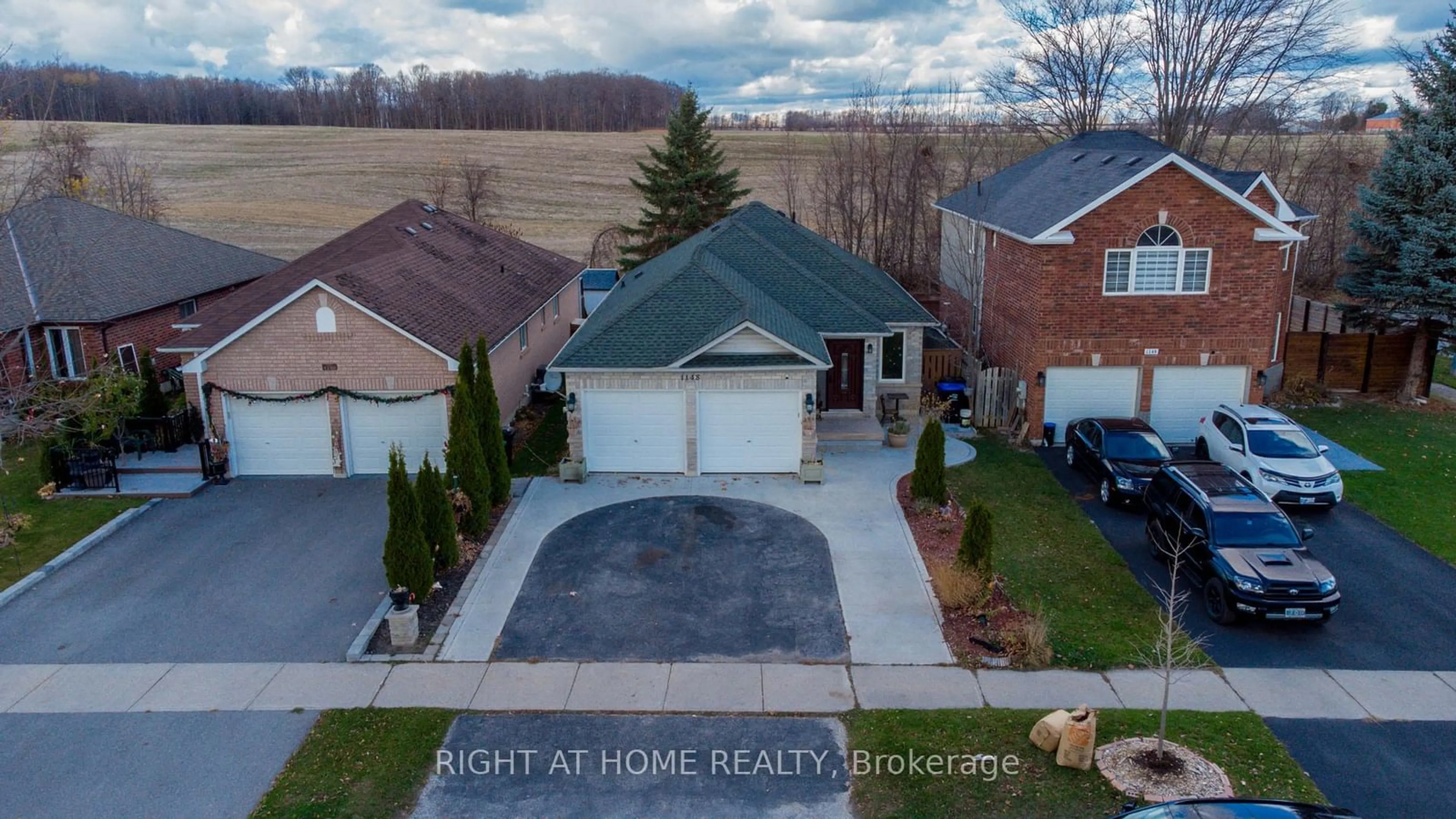 Frontside or backside of a home, the street view for 1148 Leslie Dr, Innisfil Ontario L9S 2A8