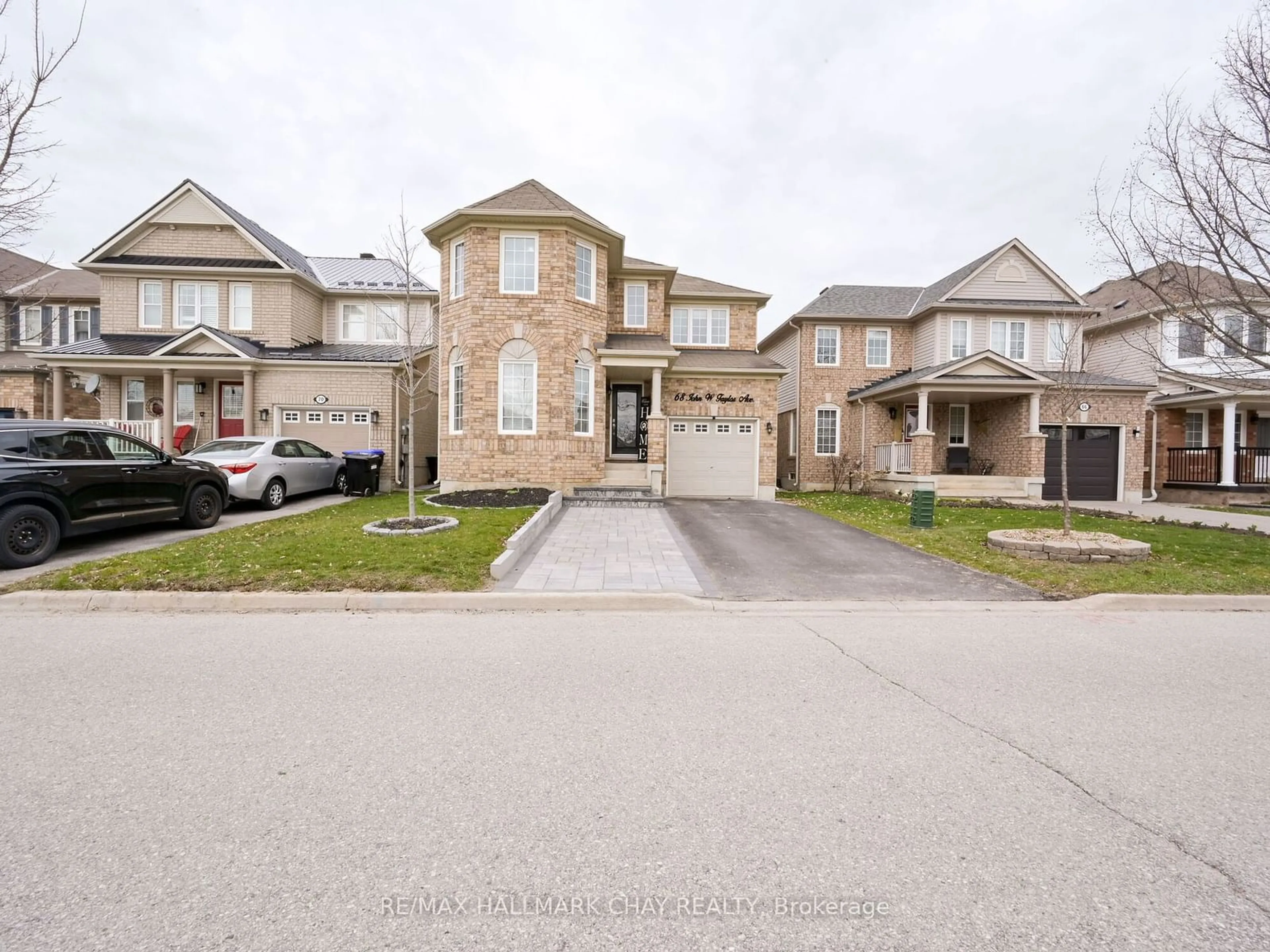 Frontside or backside of a home, the street view for 68 John W Taylor Ave, New Tecumseth Ontario L9R 0B5