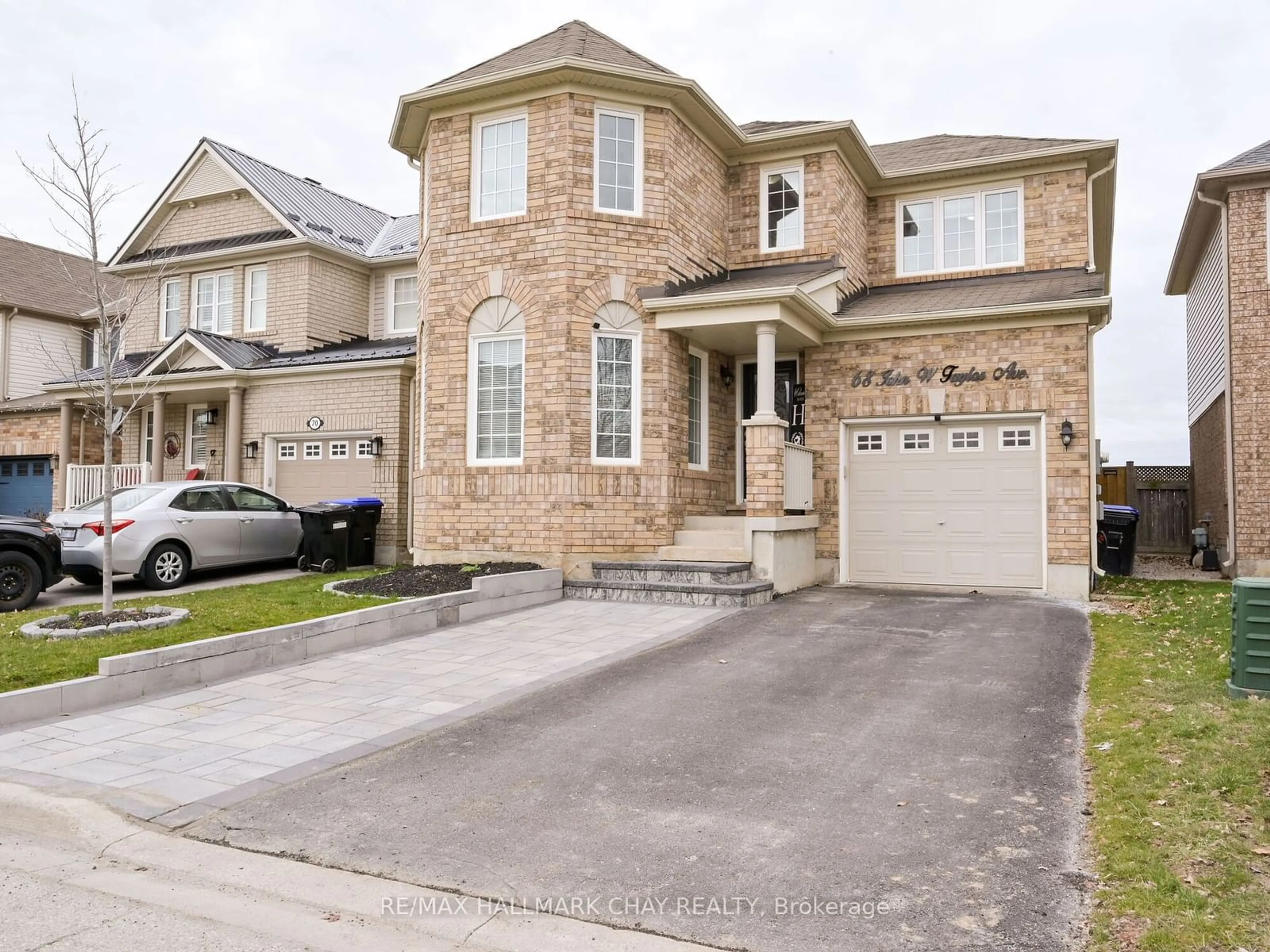 Frontside or backside of a home, the street view for 68 John W Taylor Ave, New Tecumseth Ontario L9R 0B5