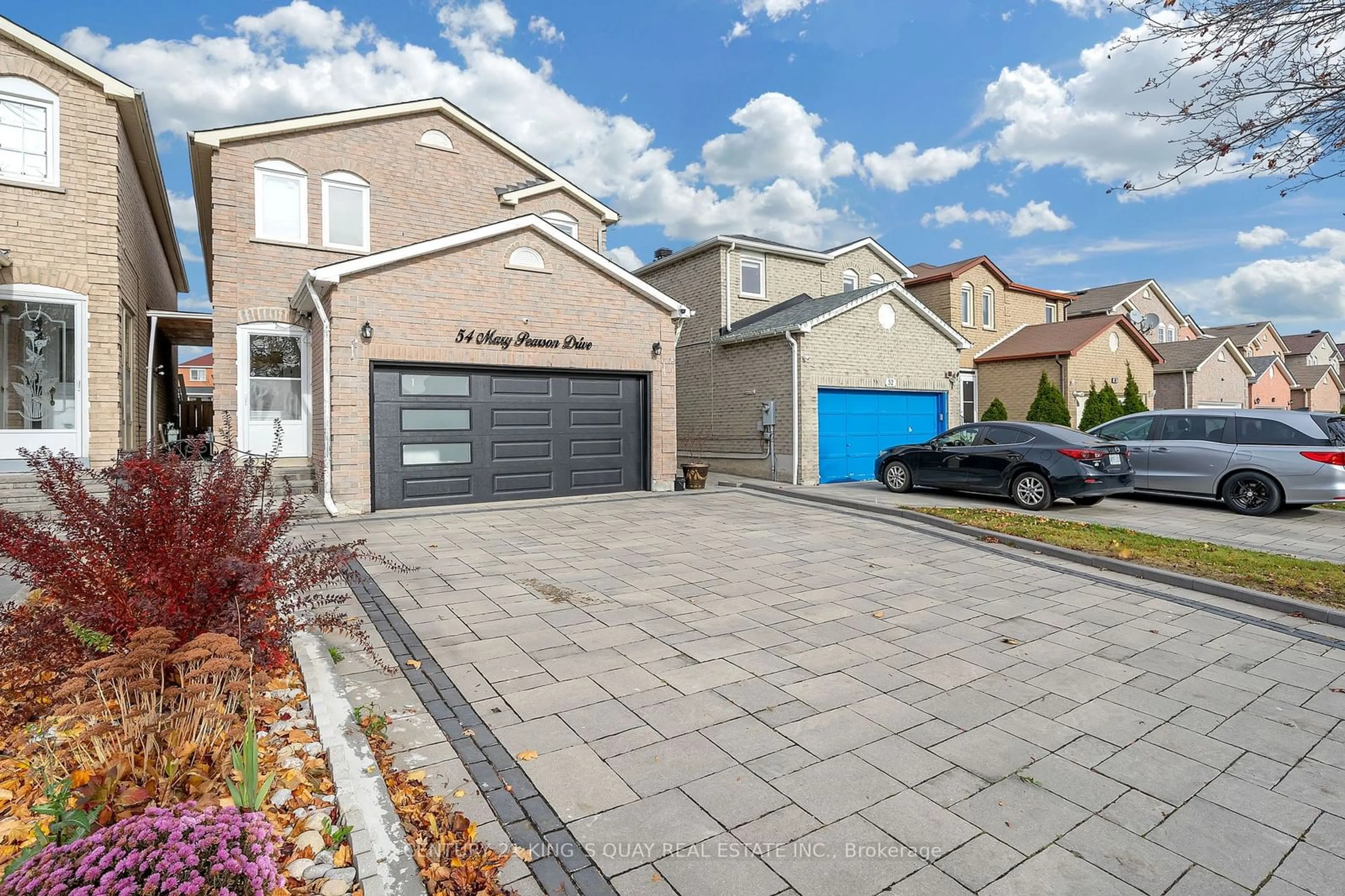 Frontside or backside of a home, the street view for 54 Mary Pearson Dr, Markham Ontario L3S 2Y7