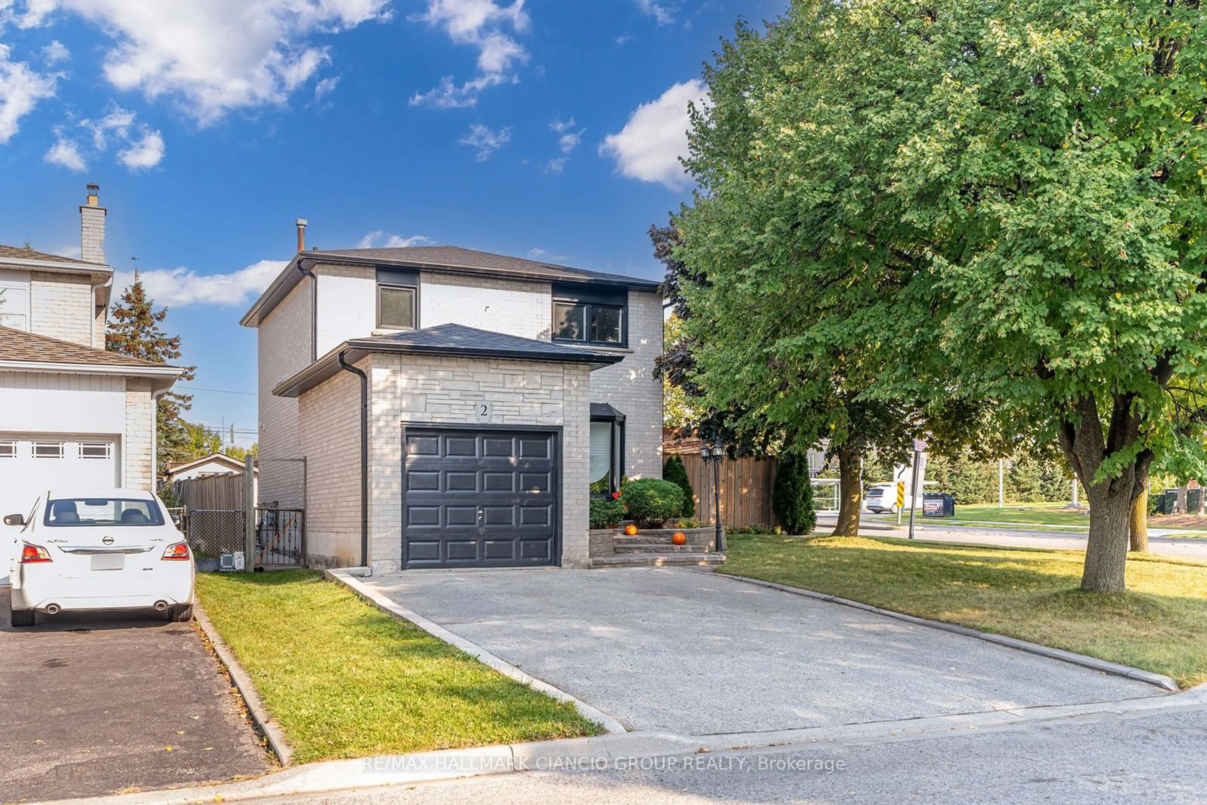 Frontside or backside of a home, the street view for 2 Woolen Mill Rd, Markham Ontario L3P 6X4