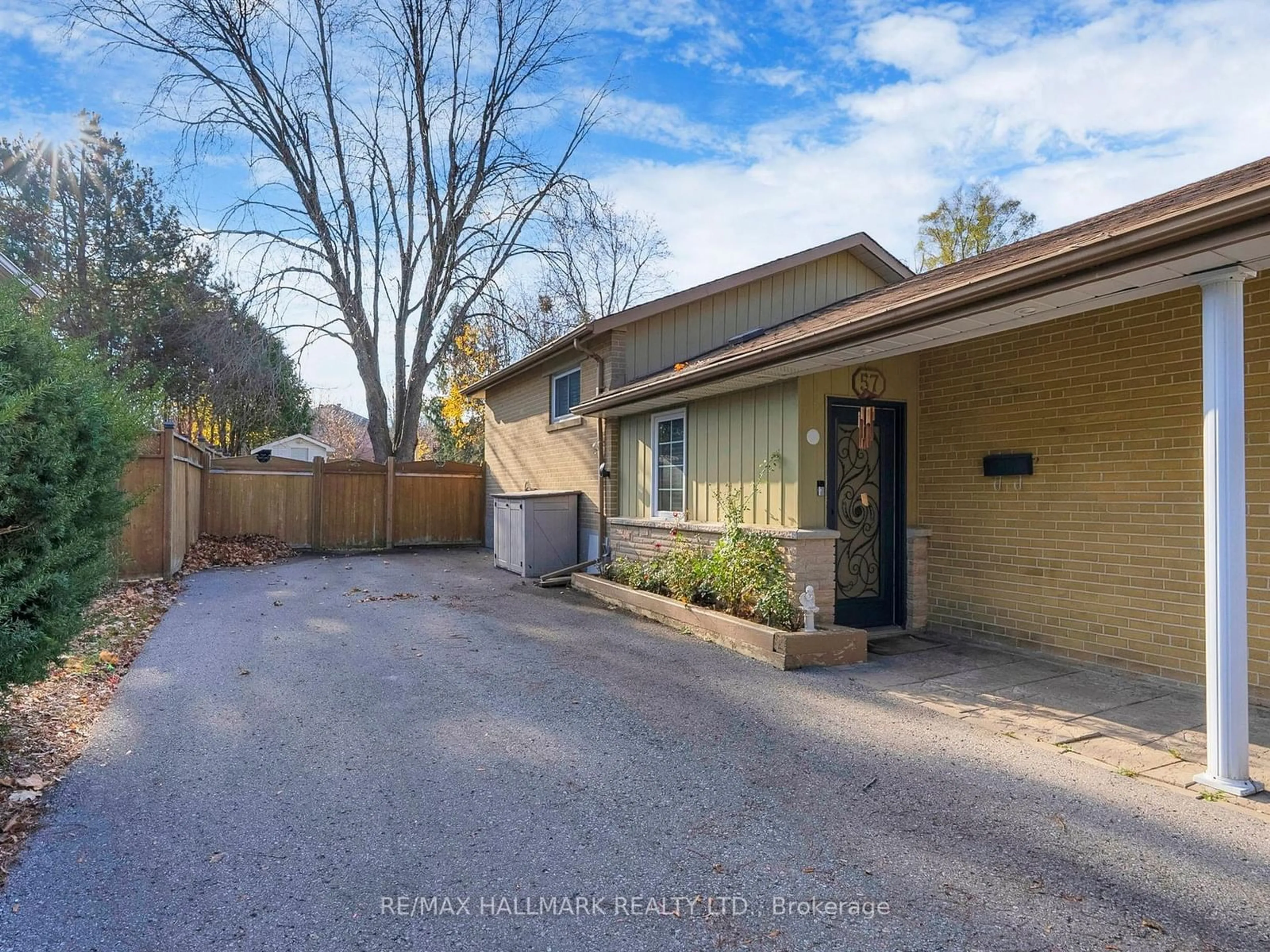 Frontside or backside of a home, the fenced backyard for 57 Richardson Dr, Aurora Ontario L4G 1Z4