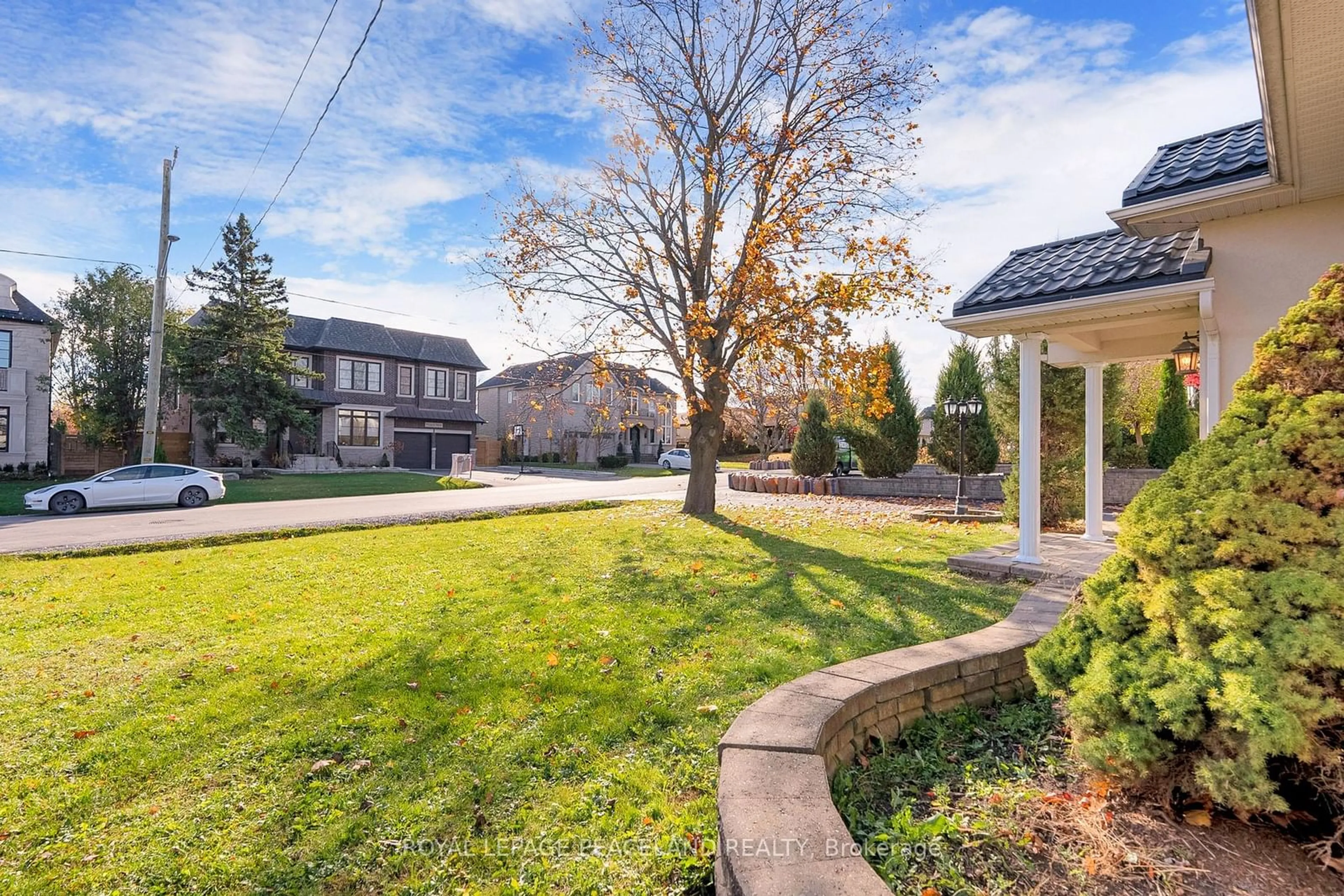 A pic from exterior of the house or condo, the fenced backyard for 10 Lancer Dr, Vaughan Ontario L6A 1E4