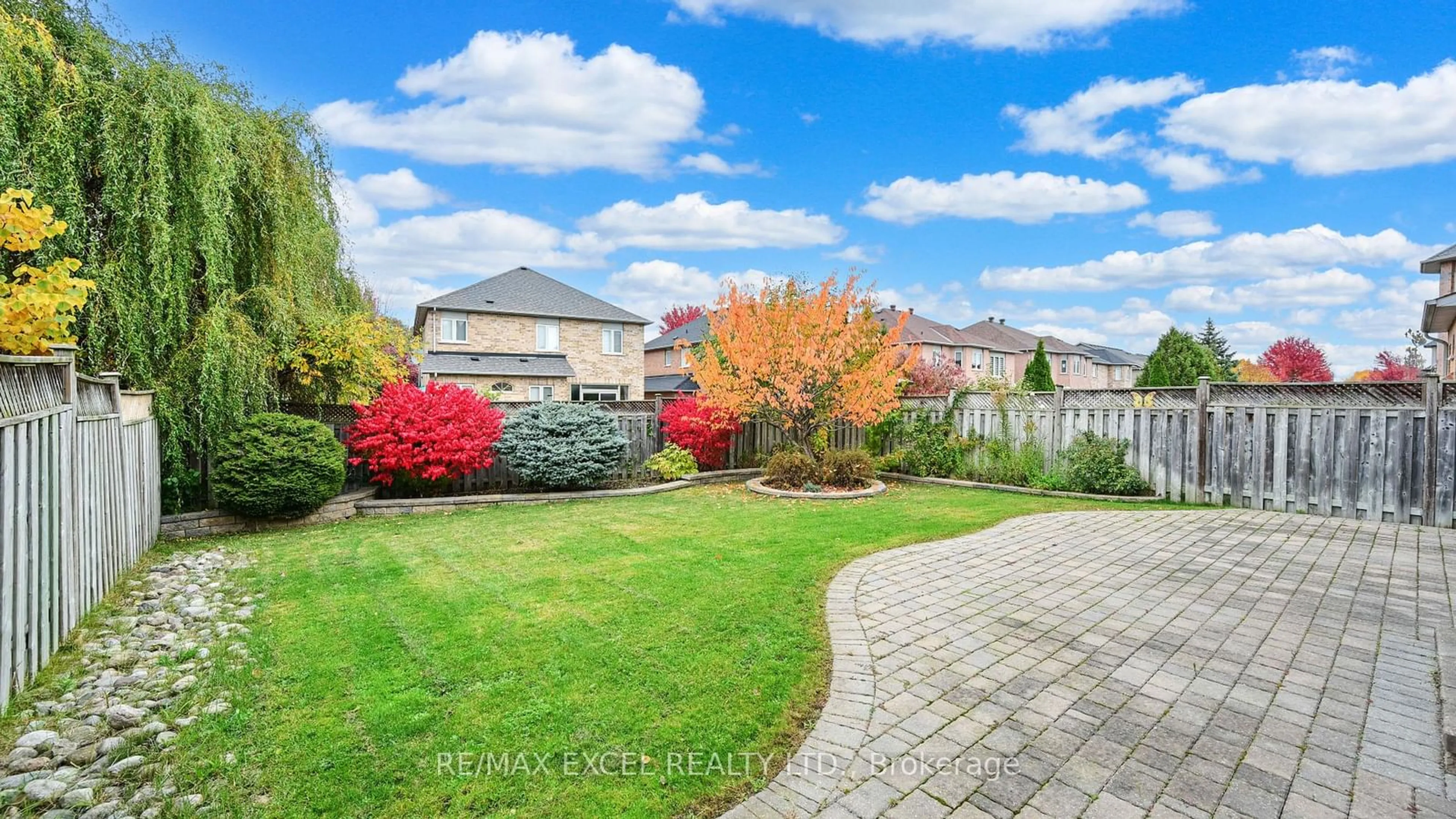 Frontside or backside of a home, the fenced backyard for 50 Quetico Dr, Richmond Hill Ontario L4B 4J2