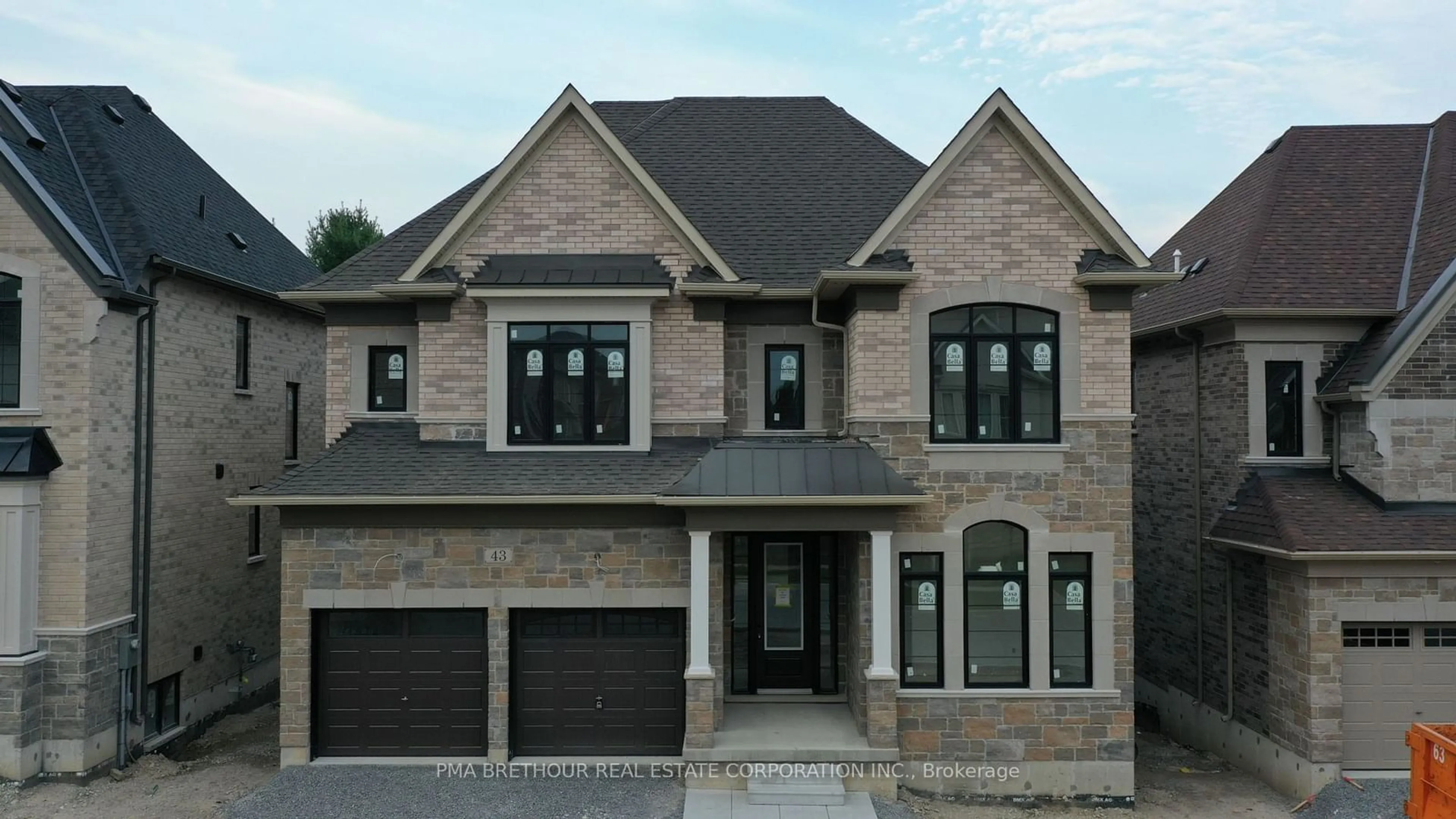 Home with brick exterior material for 43 Bush Ridge Ave, Richmond Hill Ontario L4E 0P1