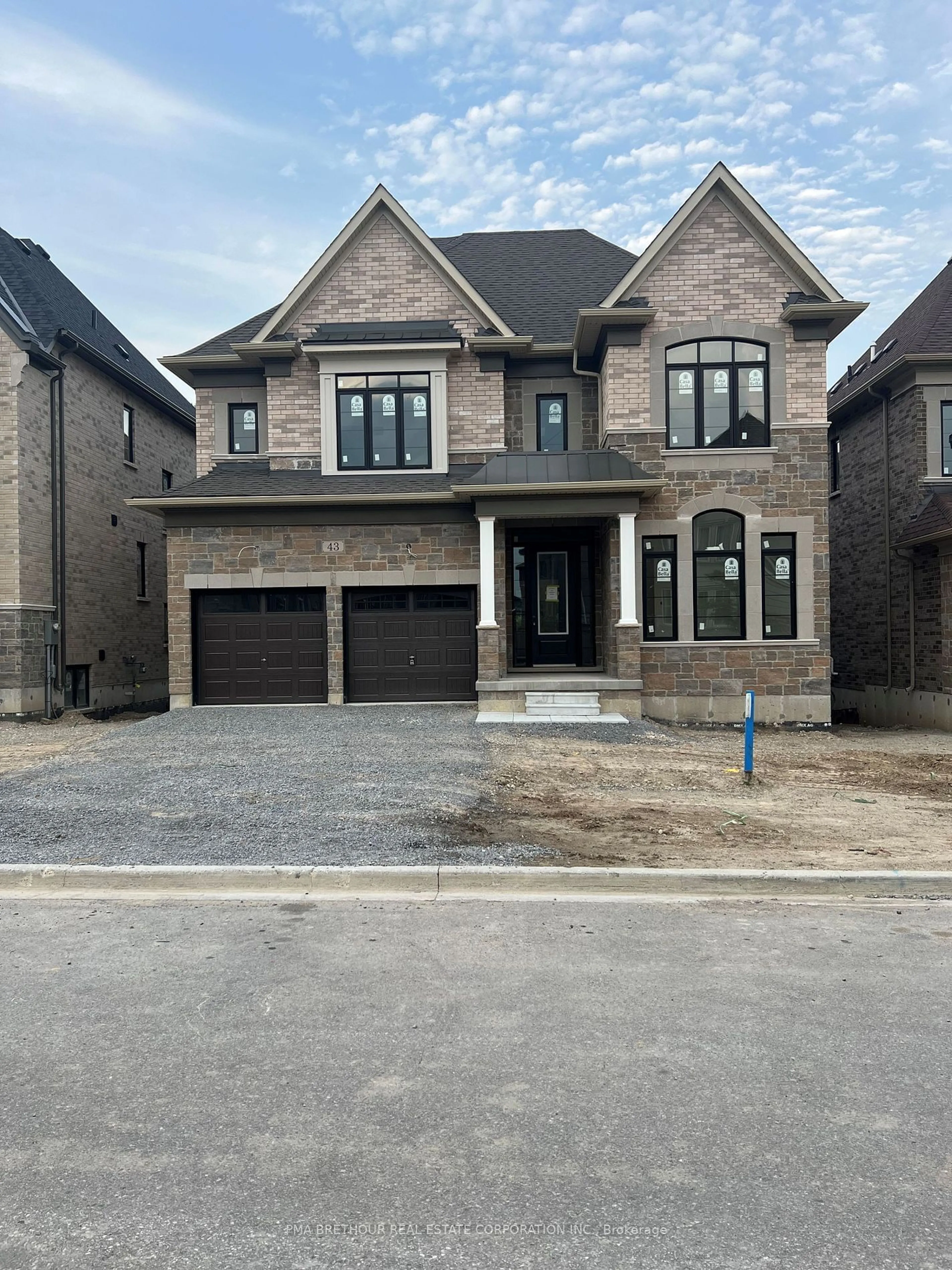 Home with brick exterior material for 43 Bush Ridge Ave, Richmond Hill Ontario L4E 0P1