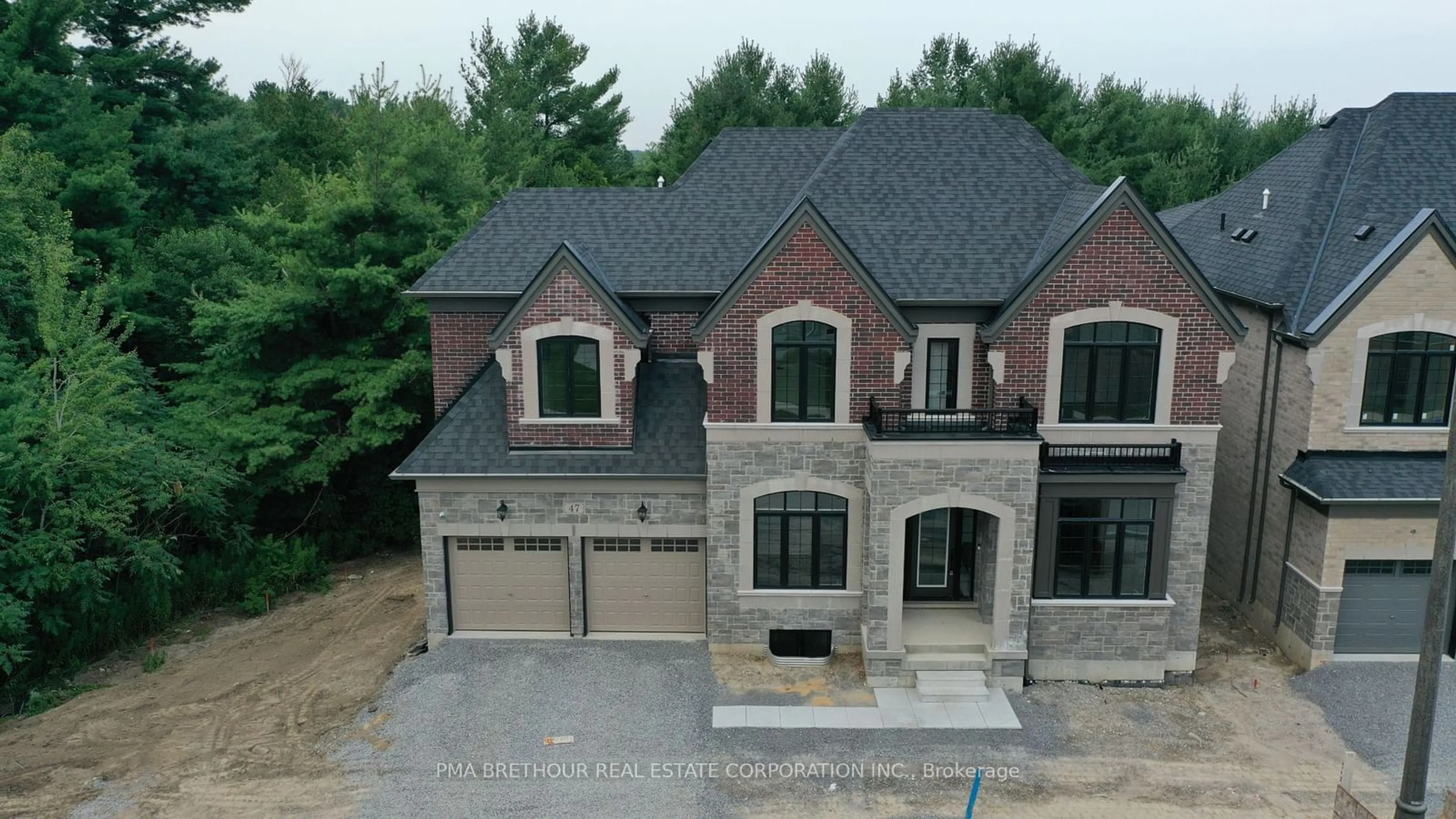 Home with brick exterior material for 47 Bush Ridges Ave, Richmond Hill Ontario L4E 0P1