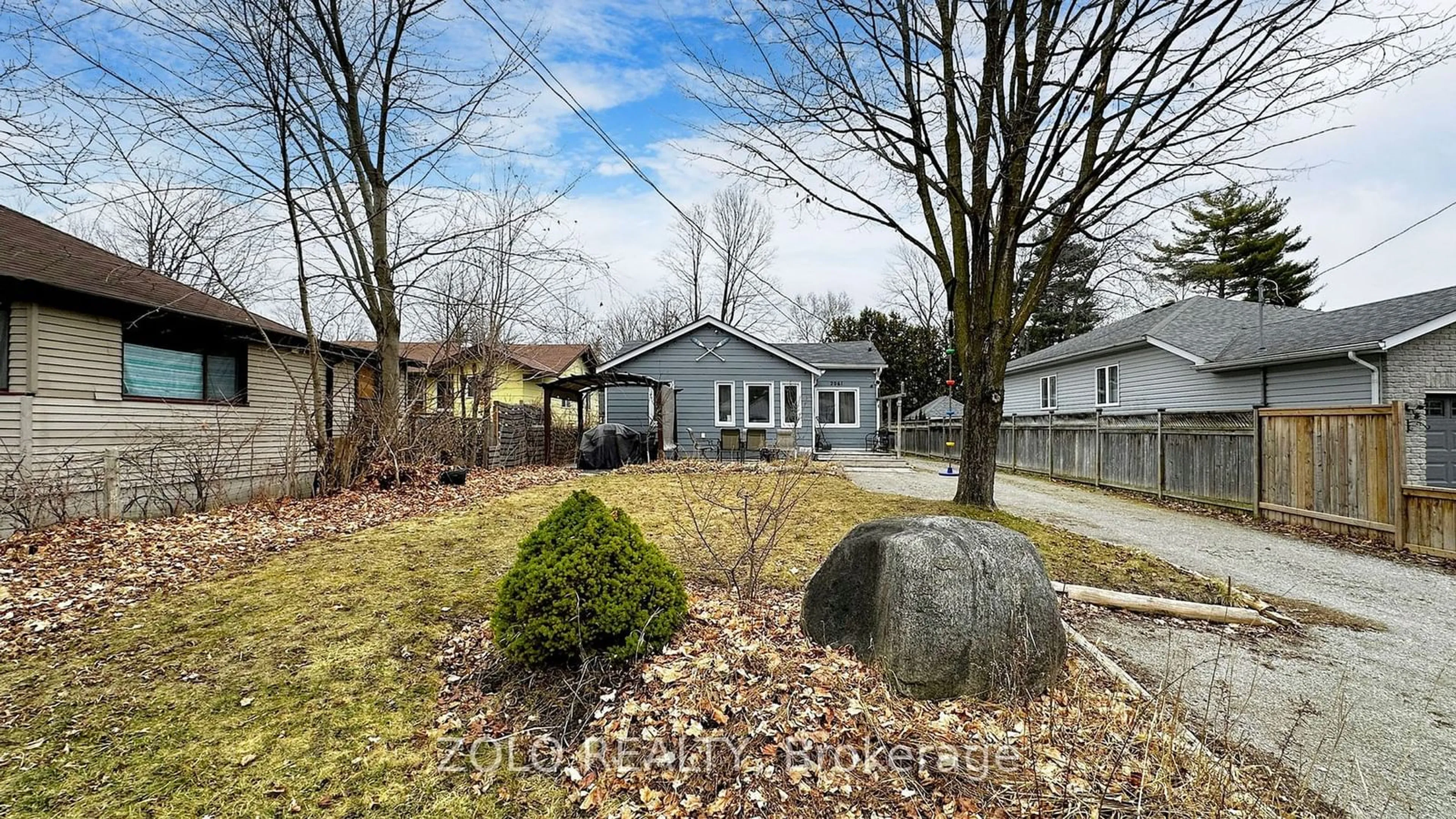 Frontside or backside of a home, the fenced backyard for 2061 Eastern Ave, Innisfil Ontario L9S 4E2