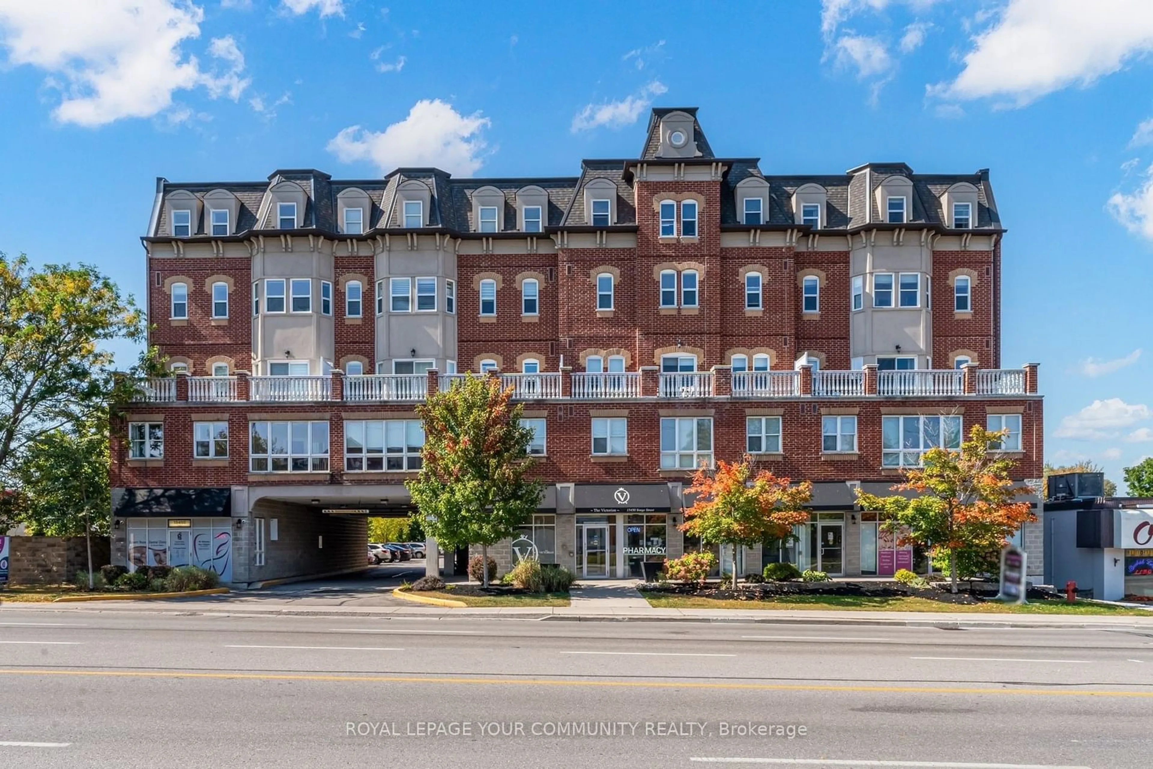 A pic from exterior of the house or condo, the front or back of building for 15450 Yonge St #414, Aurora Ontario L4G 1P2