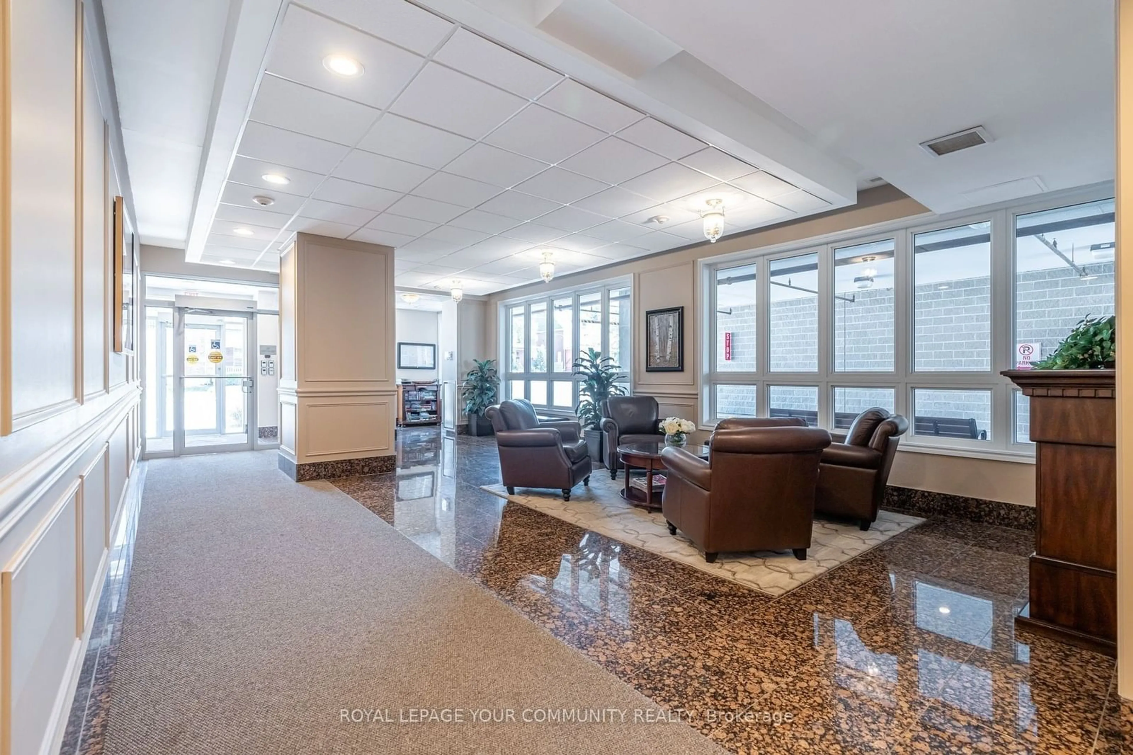 Indoor lobby, carpet floors for 15450 Yonge St #414, Aurora Ontario L4G 1P2