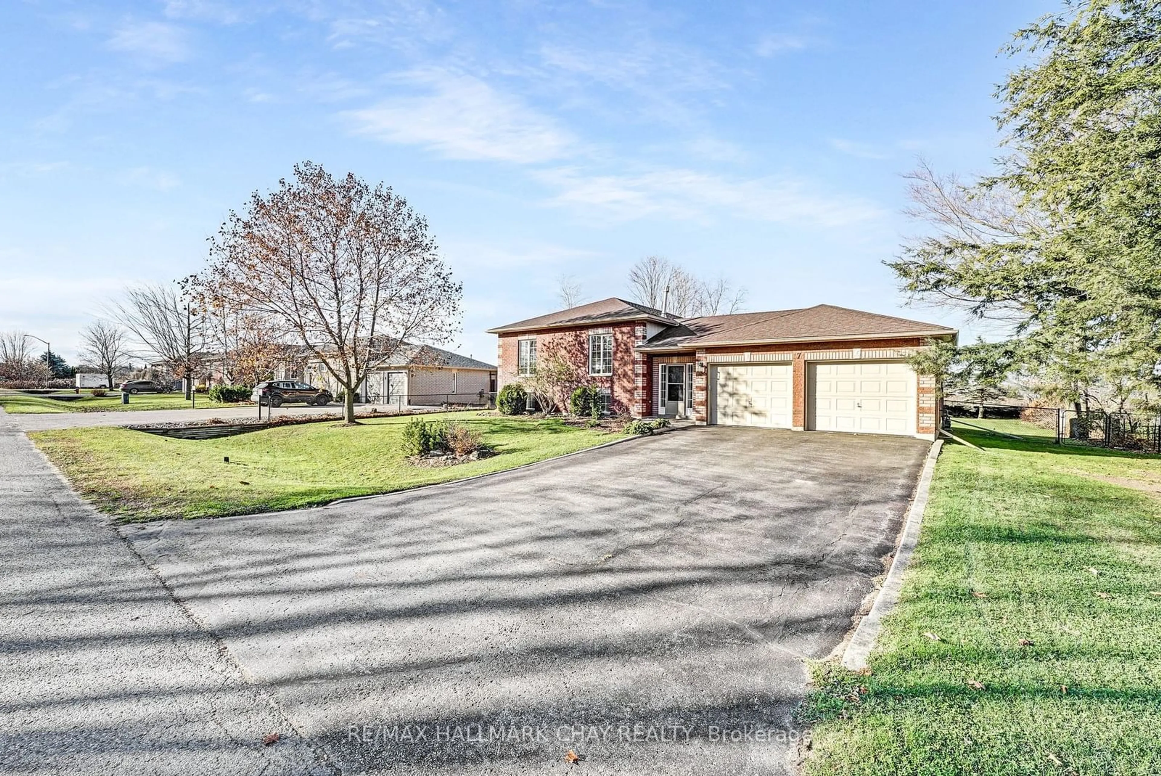 Frontside or backside of a home, the street view for 7 Columbus Lane, Adjala-Tosorontio Ontario L0M 1J0