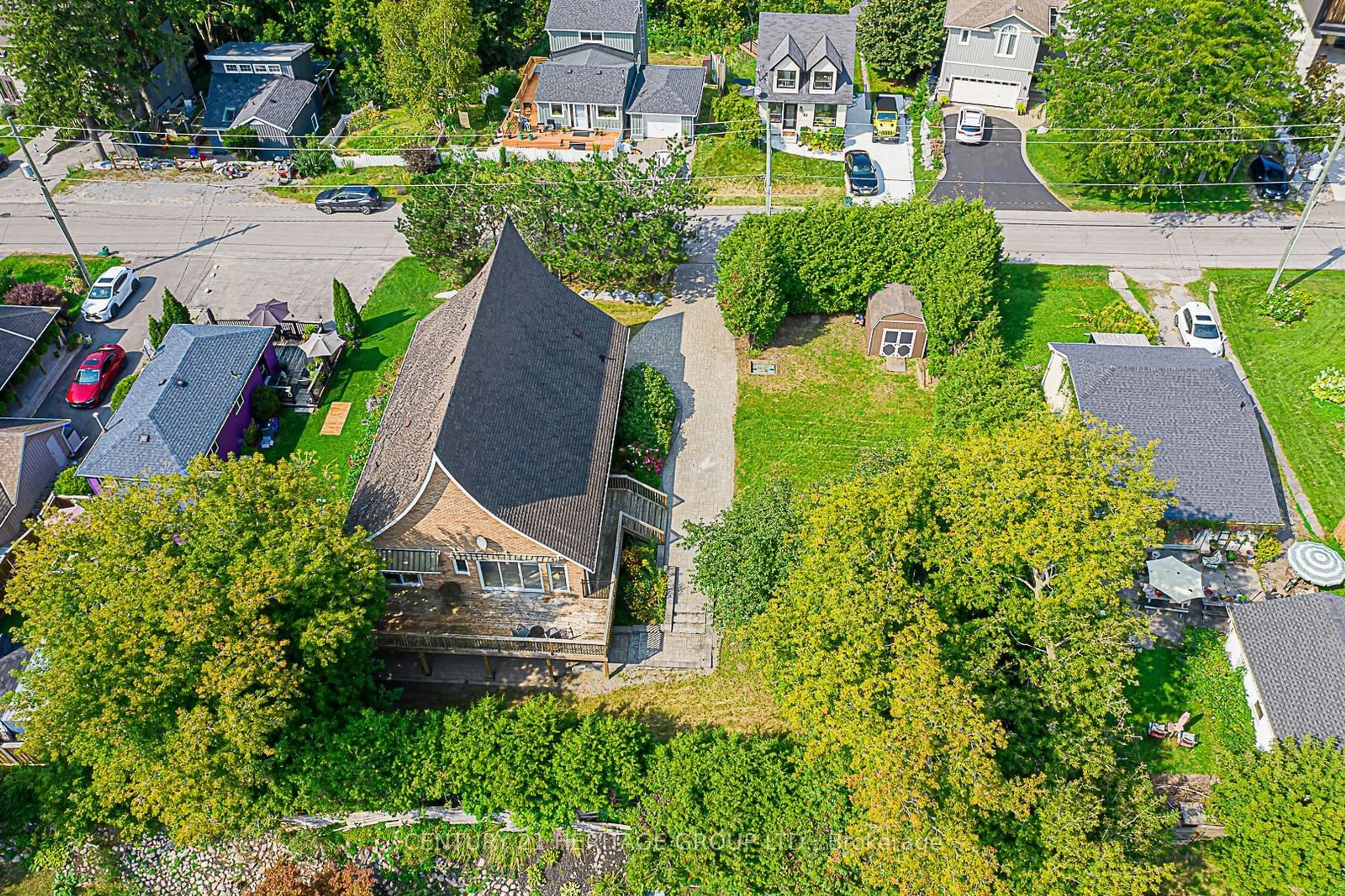 Frontside or backside of a home, the fenced backyard for 21 Windsor Dr, Whitchurch-Stouffville Ontario L4A 7X3