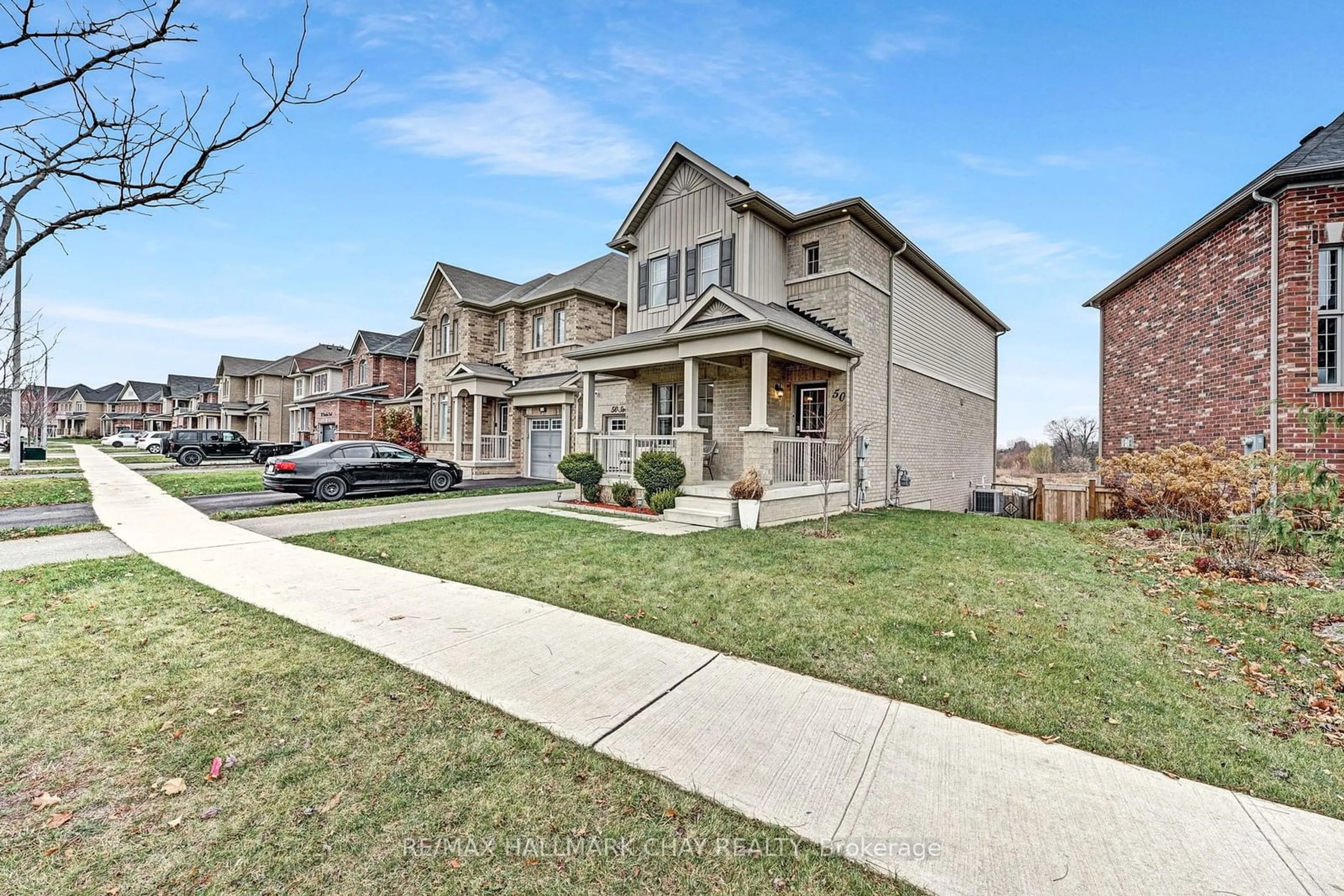 A pic from exterior of the house or condo, the street view for 50 Strachan Tr, New Tecumseth Ontario L0G 1A0