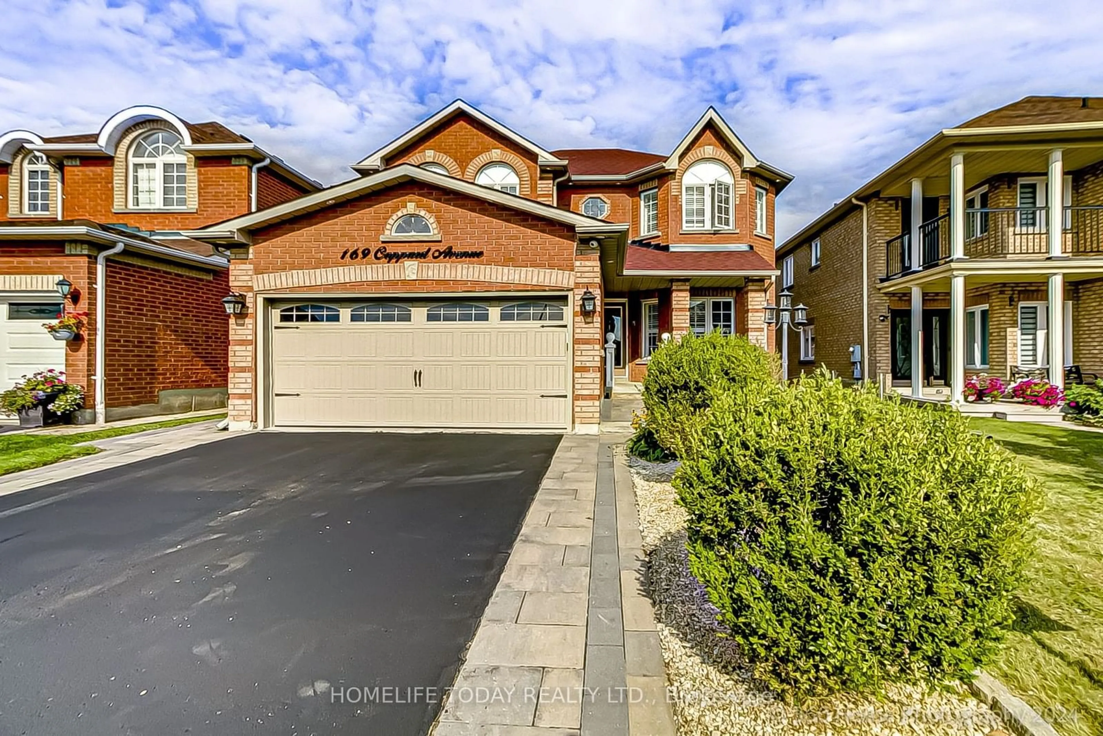 Frontside or backside of a home, the street view for 169 Coppard Ave, Markham Ontario L3S 3Z4