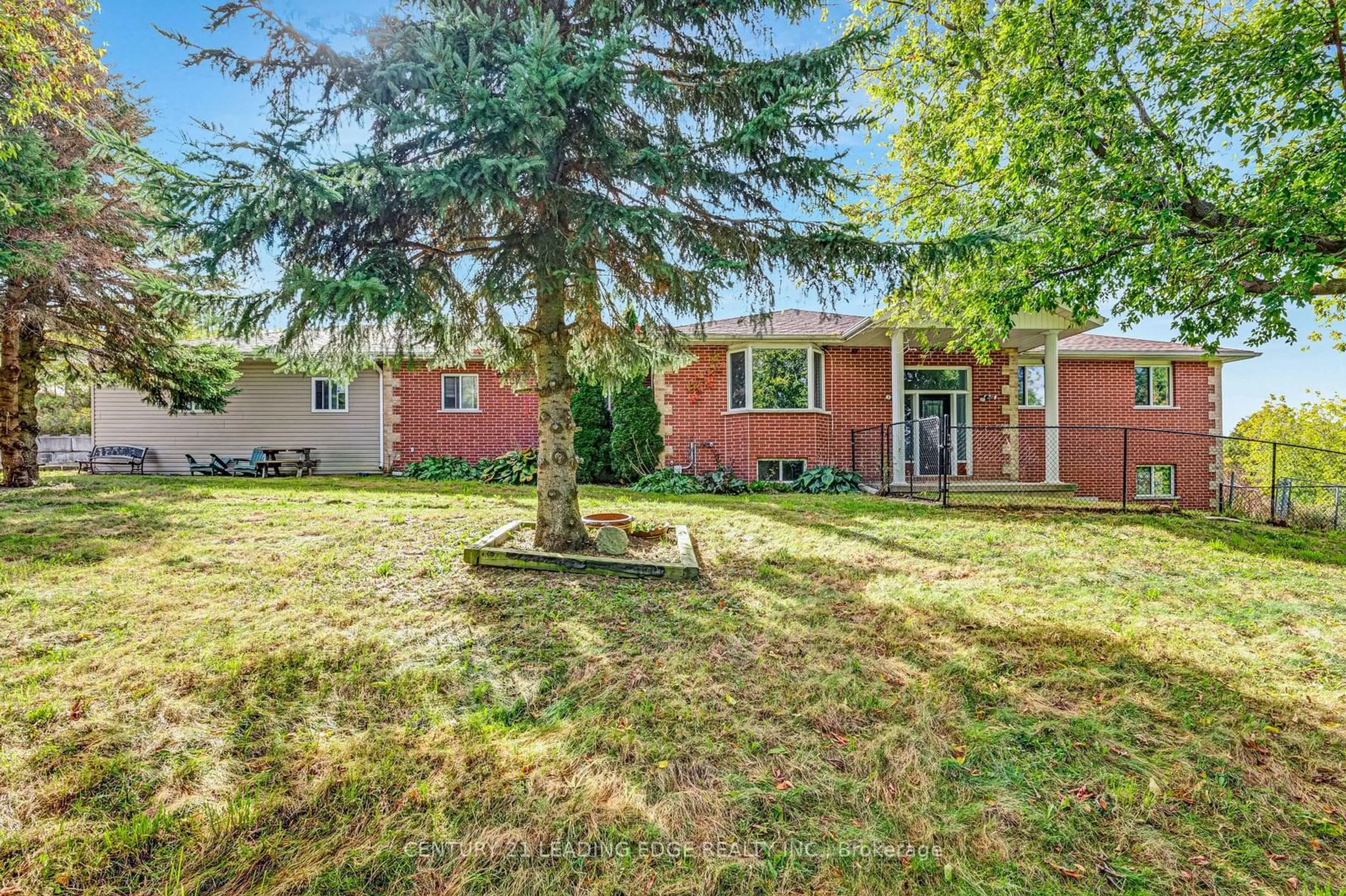 Frontside or backside of a home, the fenced backyard for 1680 Hwy 7, Brock Ontario L0C 1H0