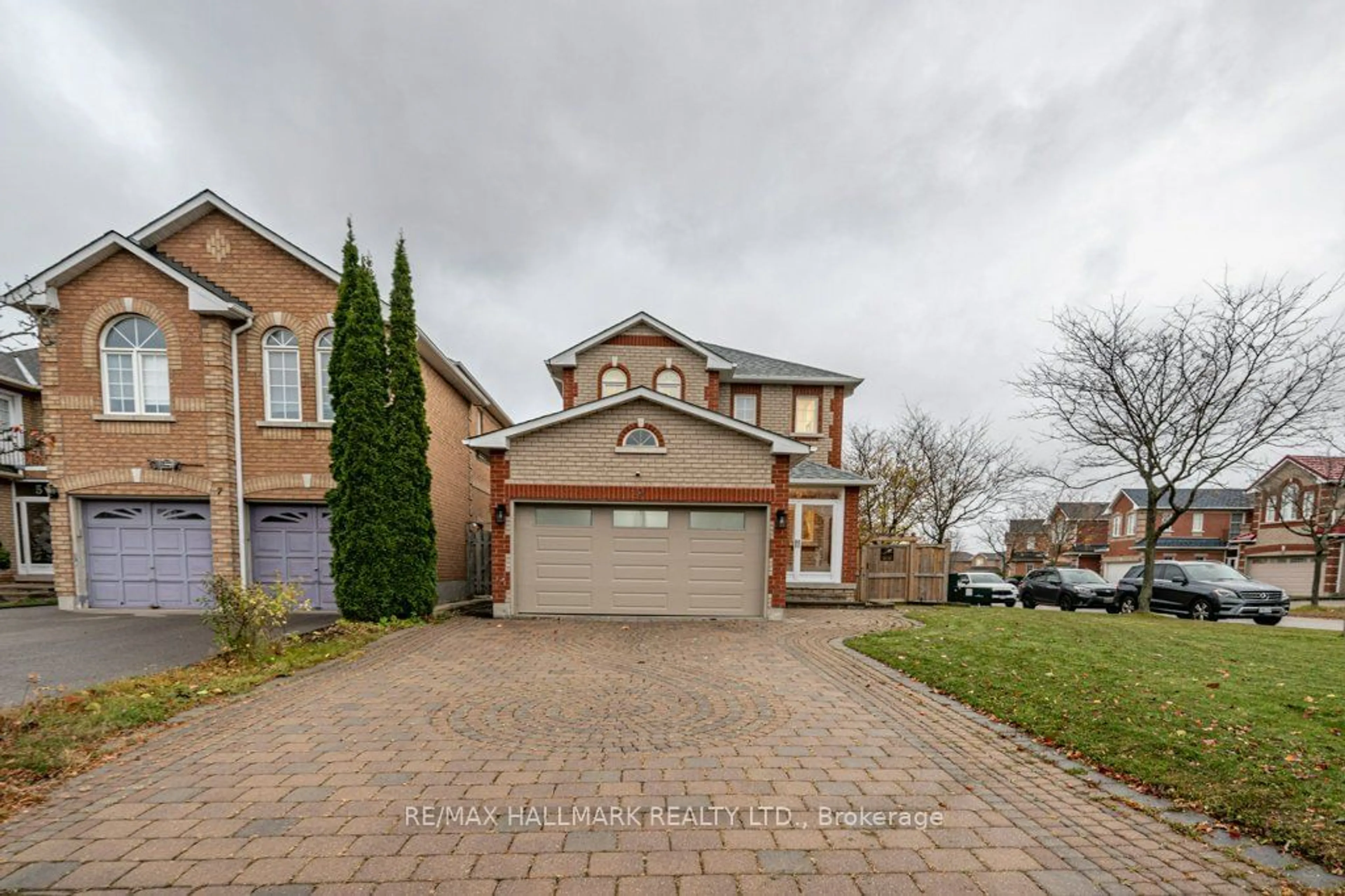 Frontside or backside of a home, the street view for 9 Blackcomb Gate, Markham Ontario L3R 4S9