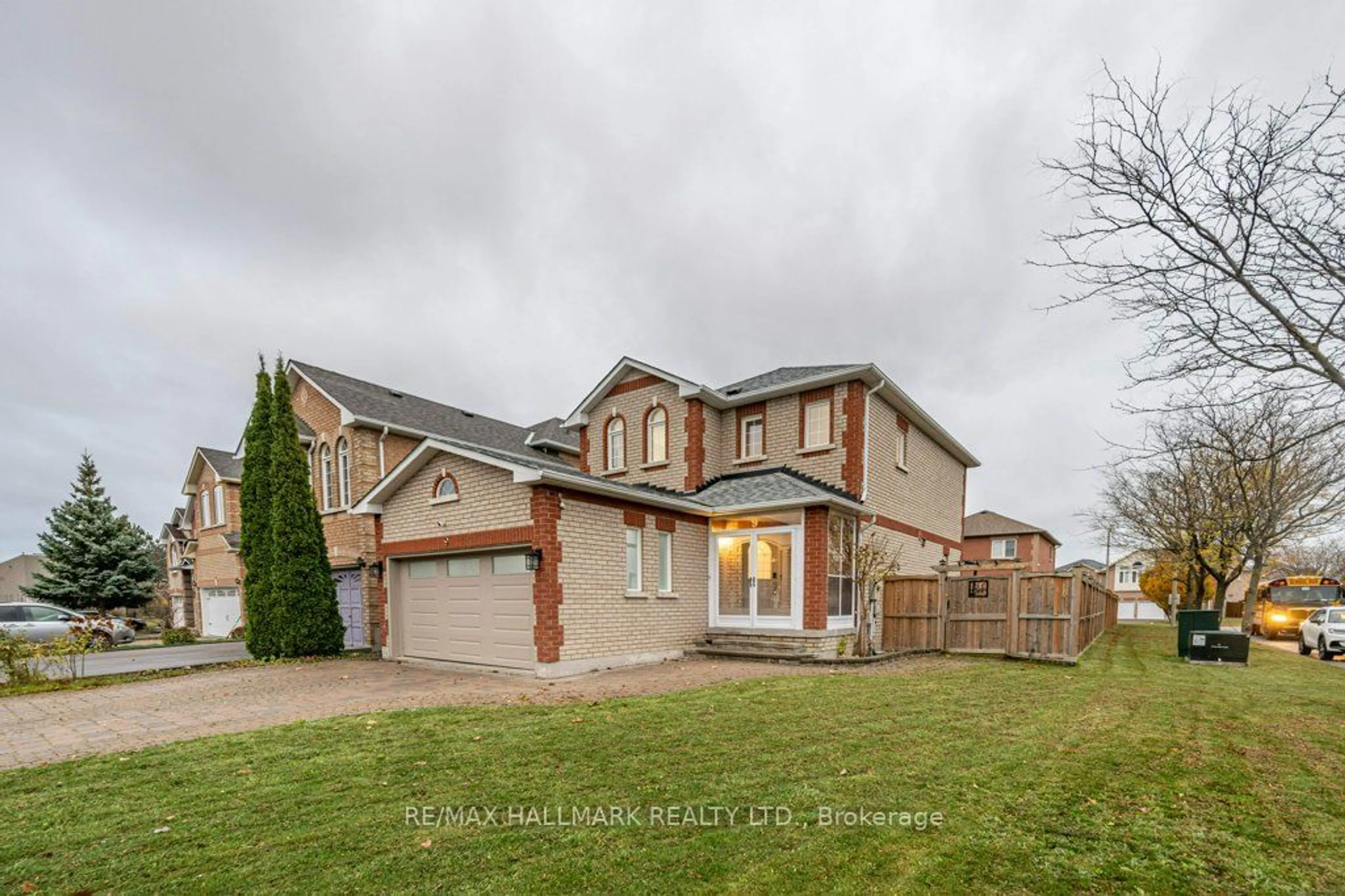 Frontside or backside of a home, the fenced backyard for 9 Blackcomb Gate, Markham Ontario L3R 4S9