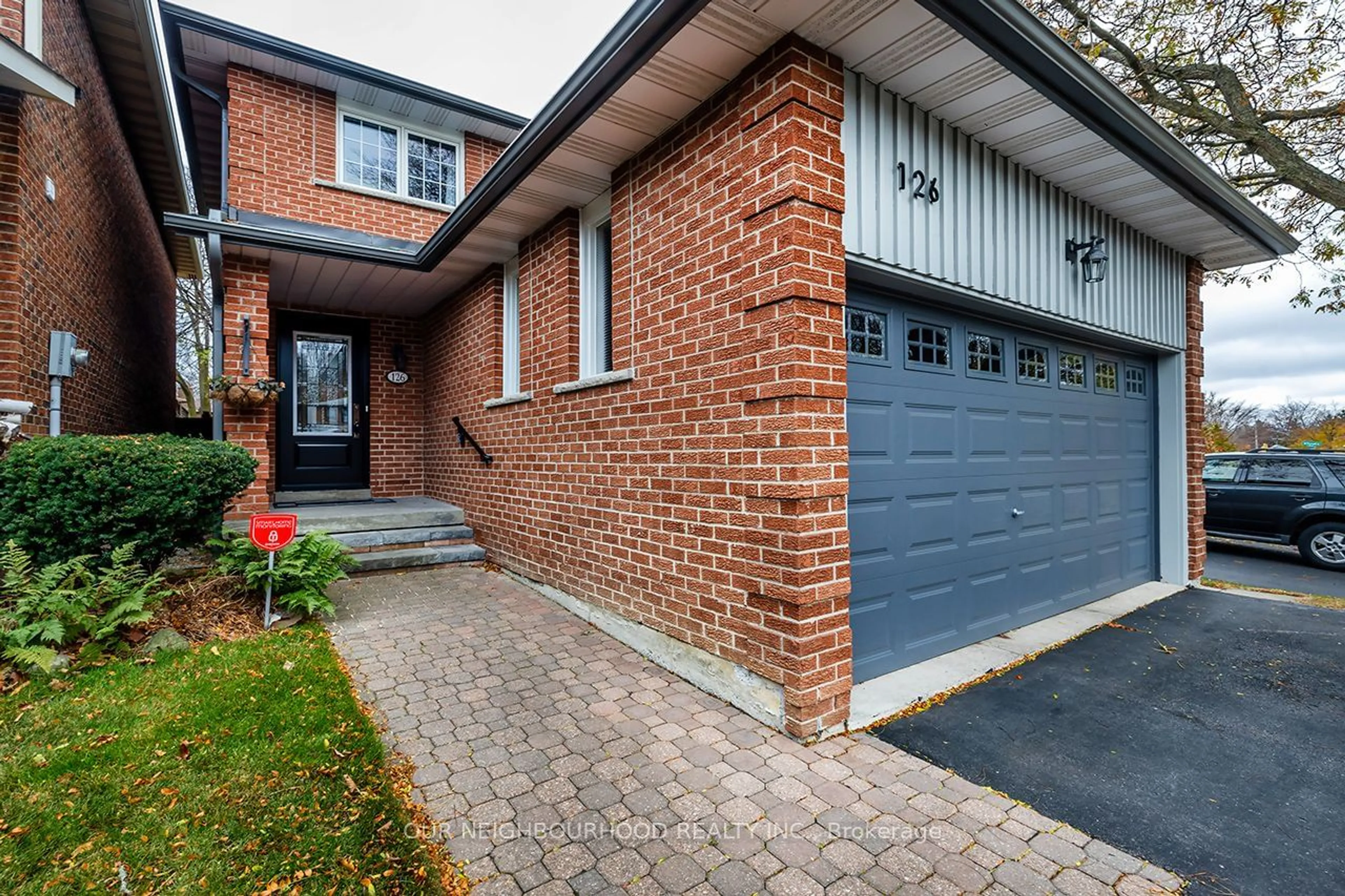 Home with brick exterior material for 126 Major Buttons Dr, Markham Ontario L3P 3X6