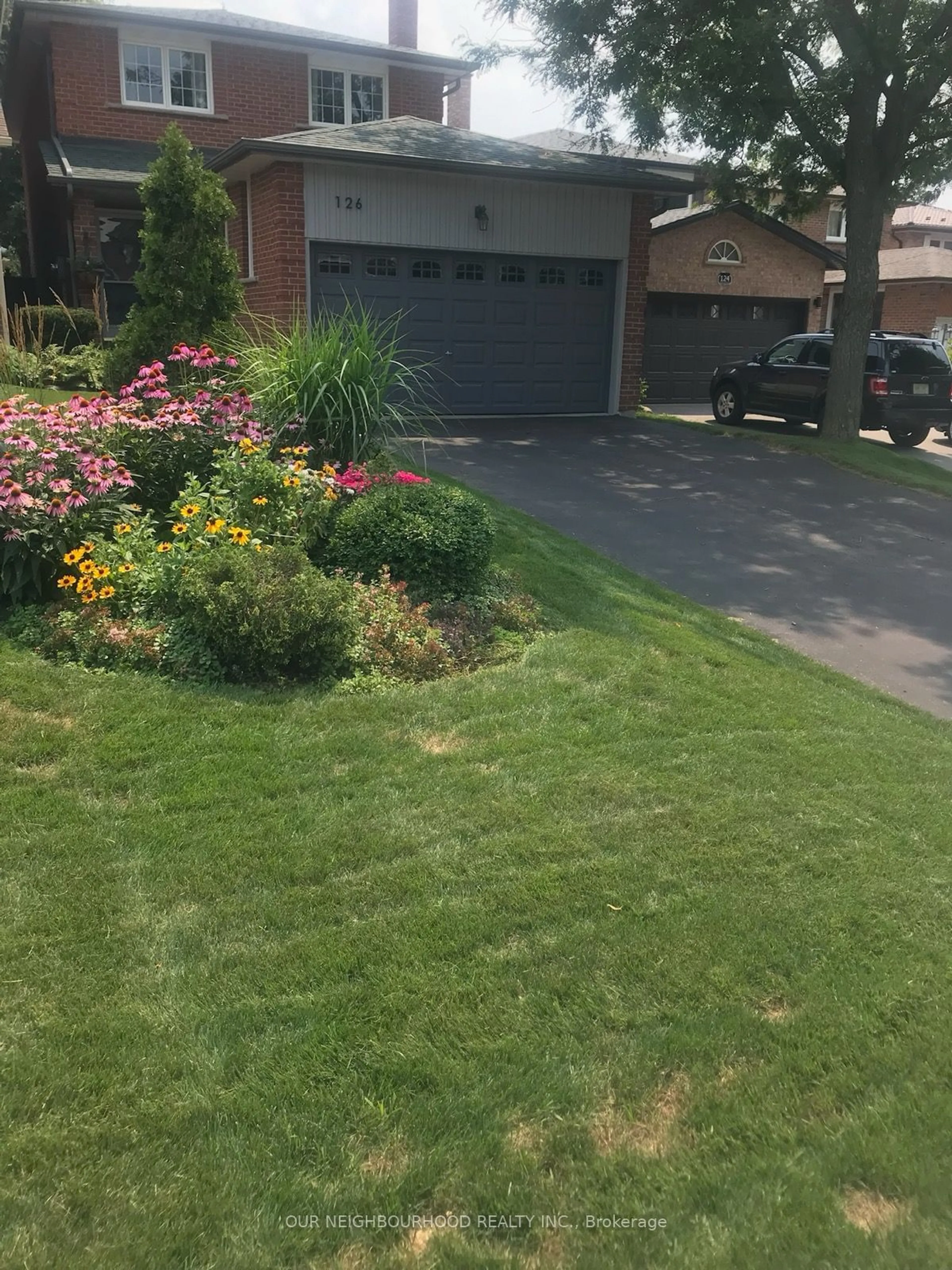 Frontside or backside of a home, the street view for 126 Major Buttons Dr, Markham Ontario L3P 3X6