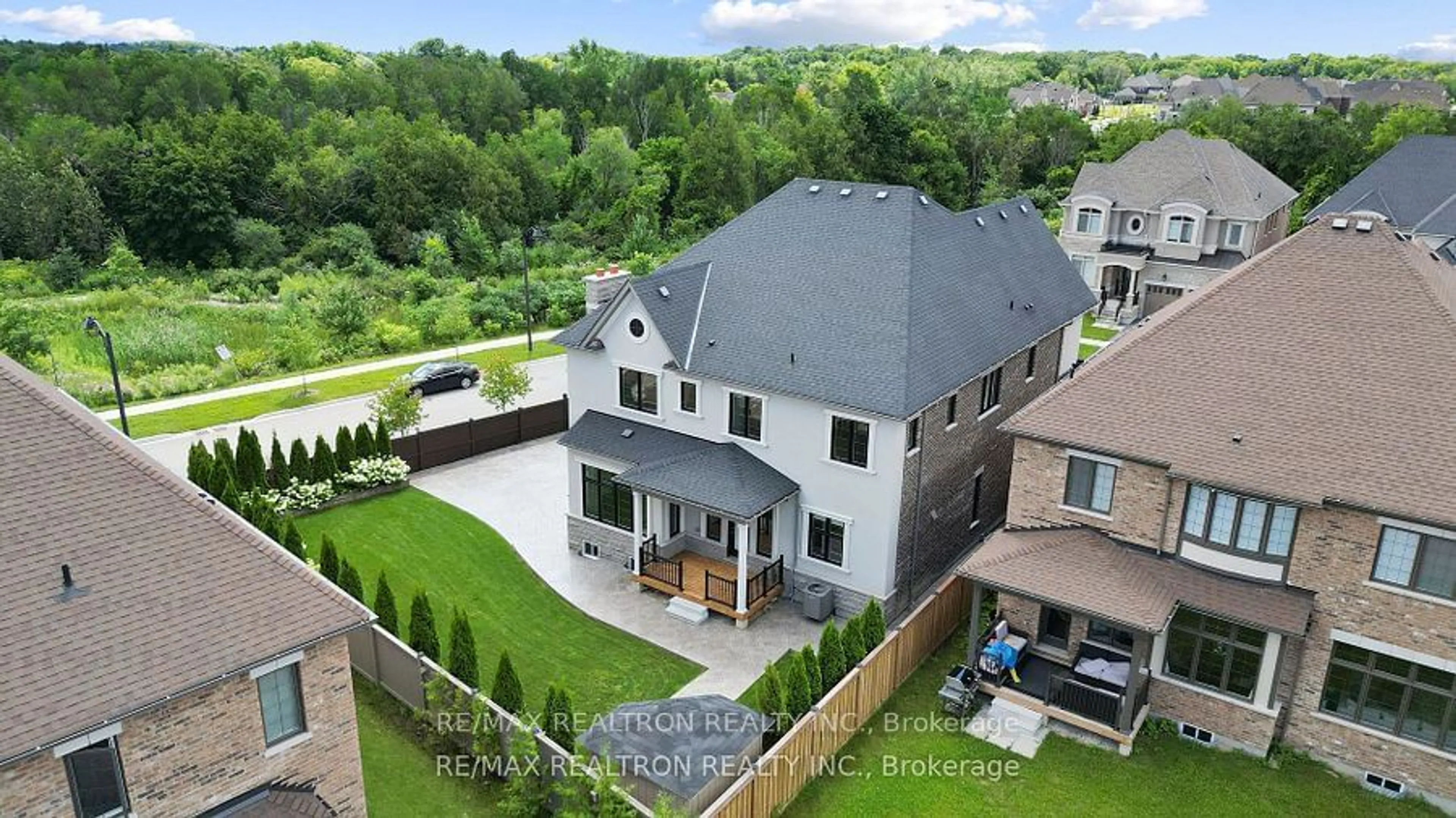 Frontside or backside of a home, the fenced backyard for 23 Cairns Gate, King Ontario L7B 0P5