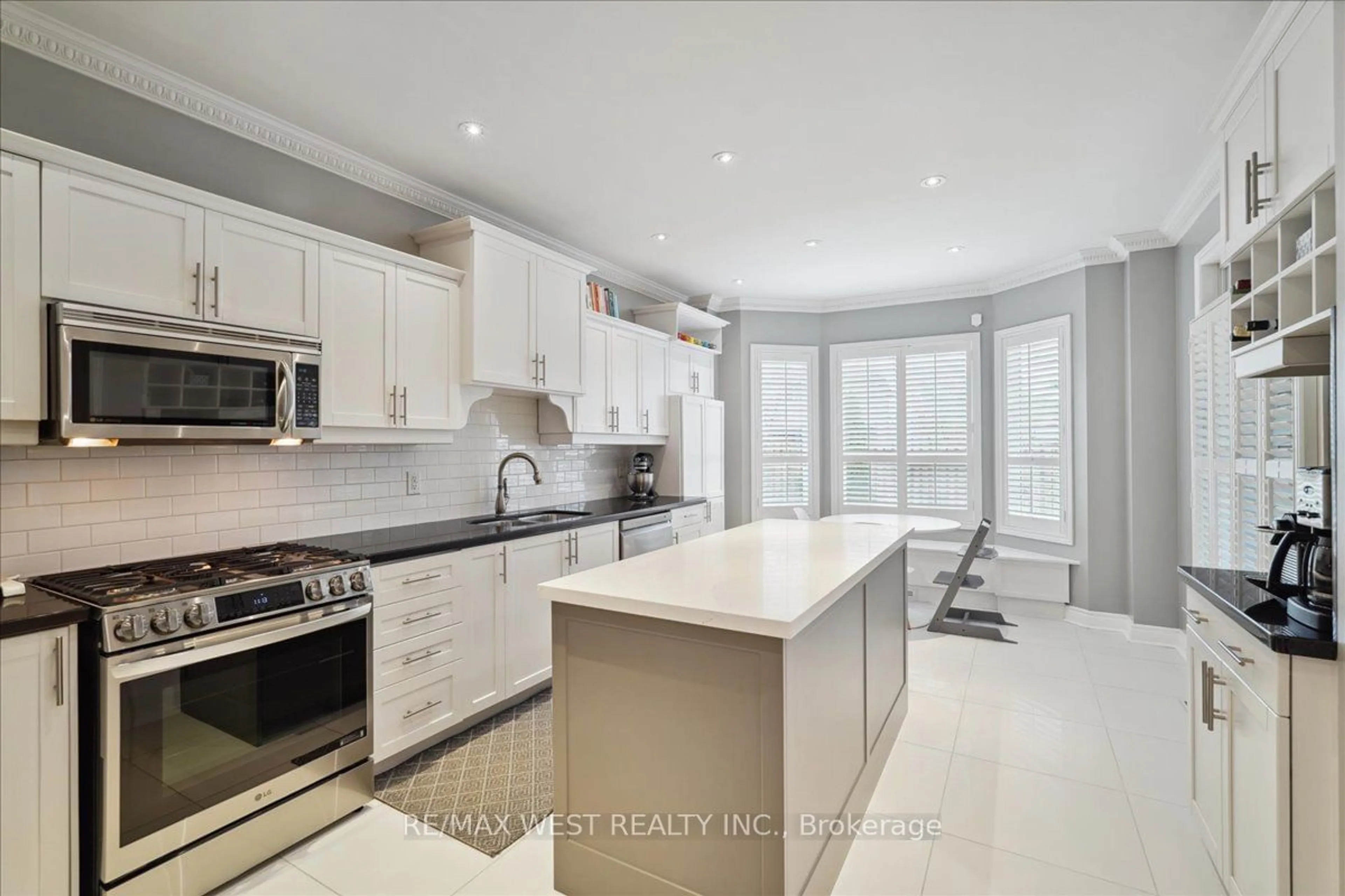 Contemporary kitchen, wood floors for 77 Via Carmine Ave, Vaughan Ontario L4H 2H9