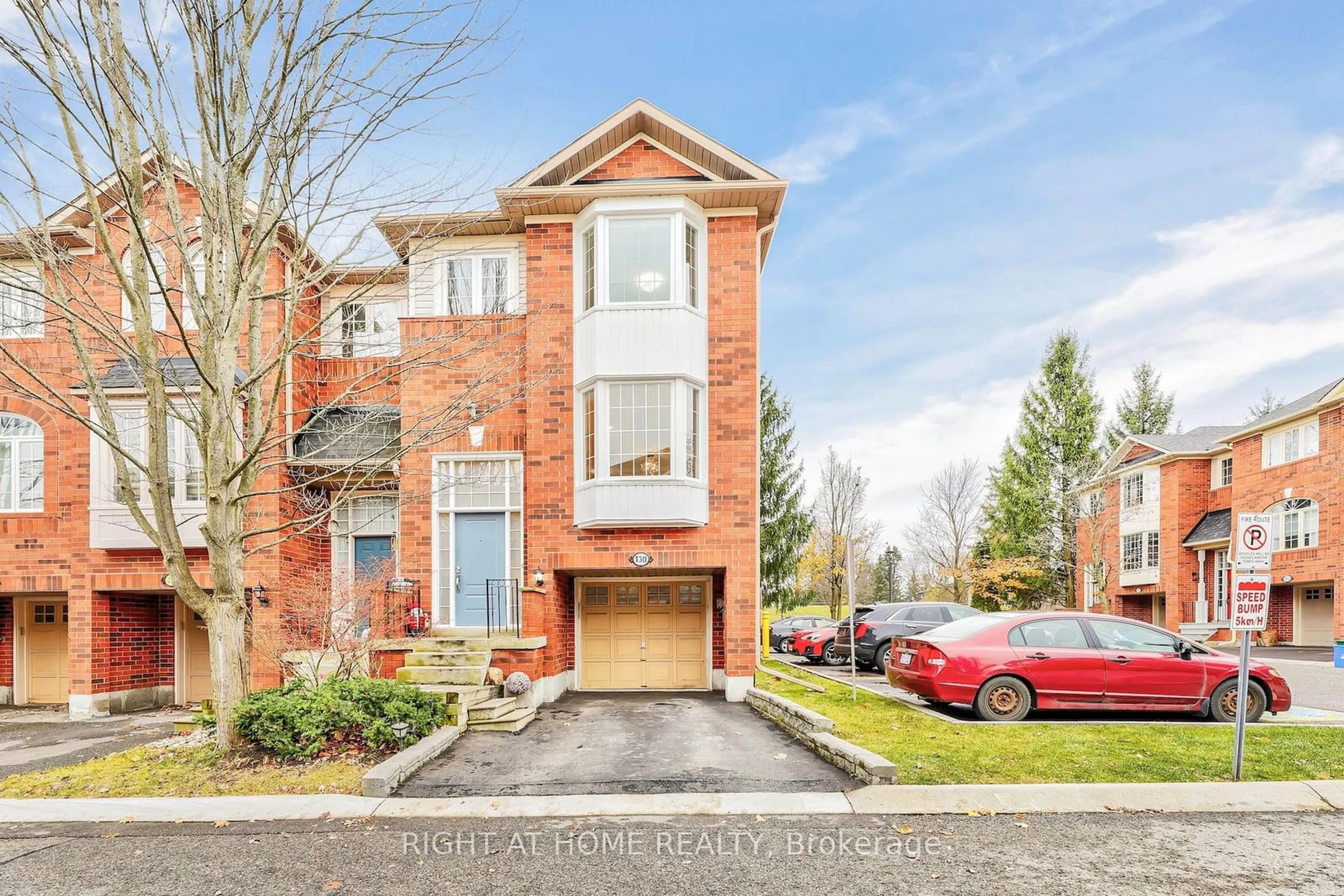 A pic from exterior of the house or condo, the street view for 130 Mosaics Ave, Aurora Ontario L4G 7L5