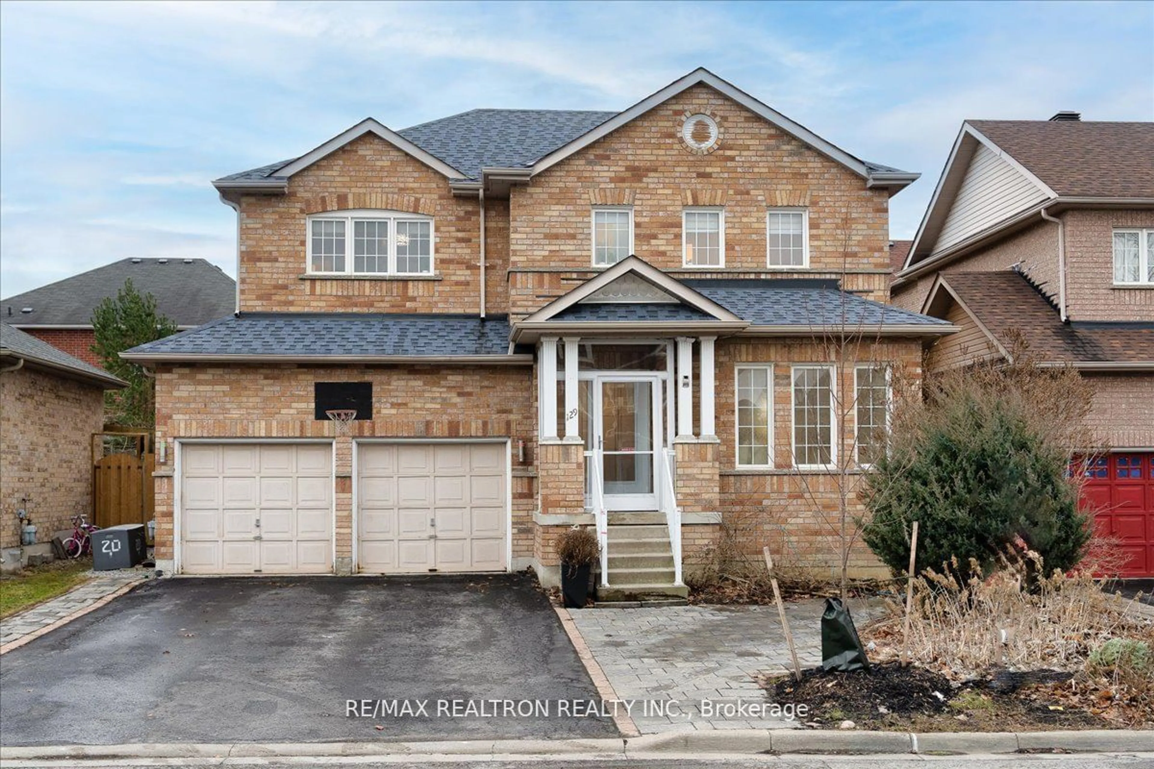 Home with brick exterior material for 129 Flagstone Way, Newmarket Ontario L3X 2Z8