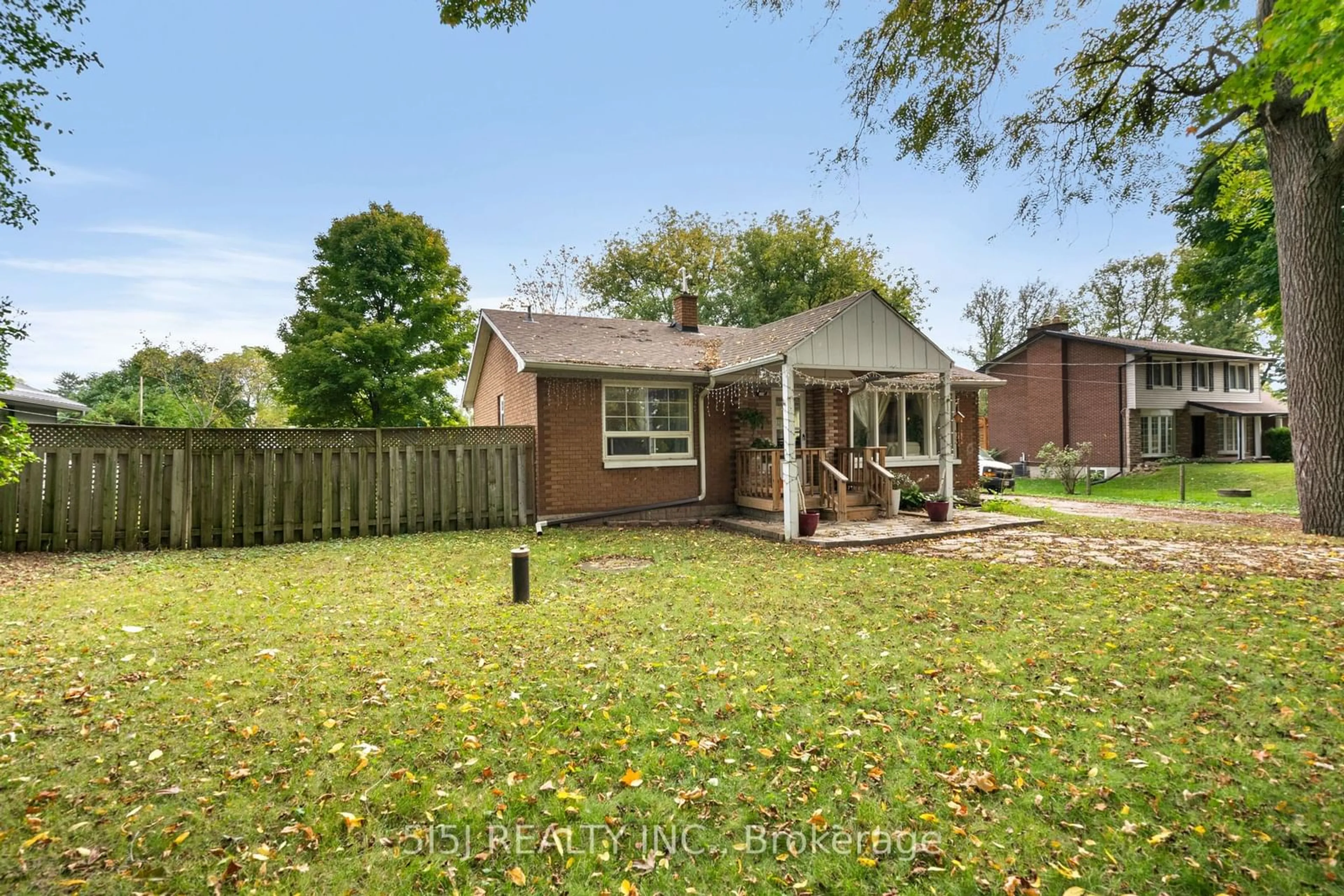 Frontside or backside of a home, the fenced backyard for 18947 Mccowan Rd, East Gwillimbury Ontario L0G 1M0