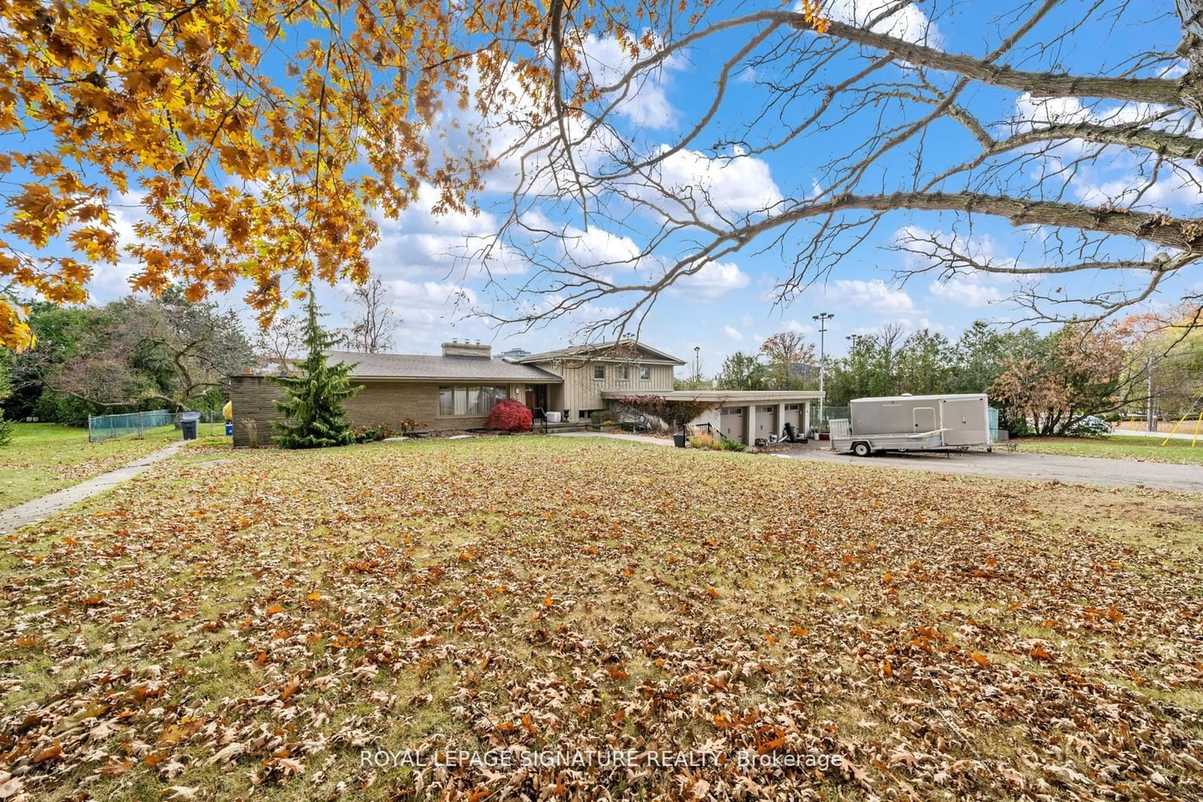 A pic from exterior of the house or condo, the fenced backyard for 83 Sylvadene Pkwy, Vaughan Ontario L4L 2M5