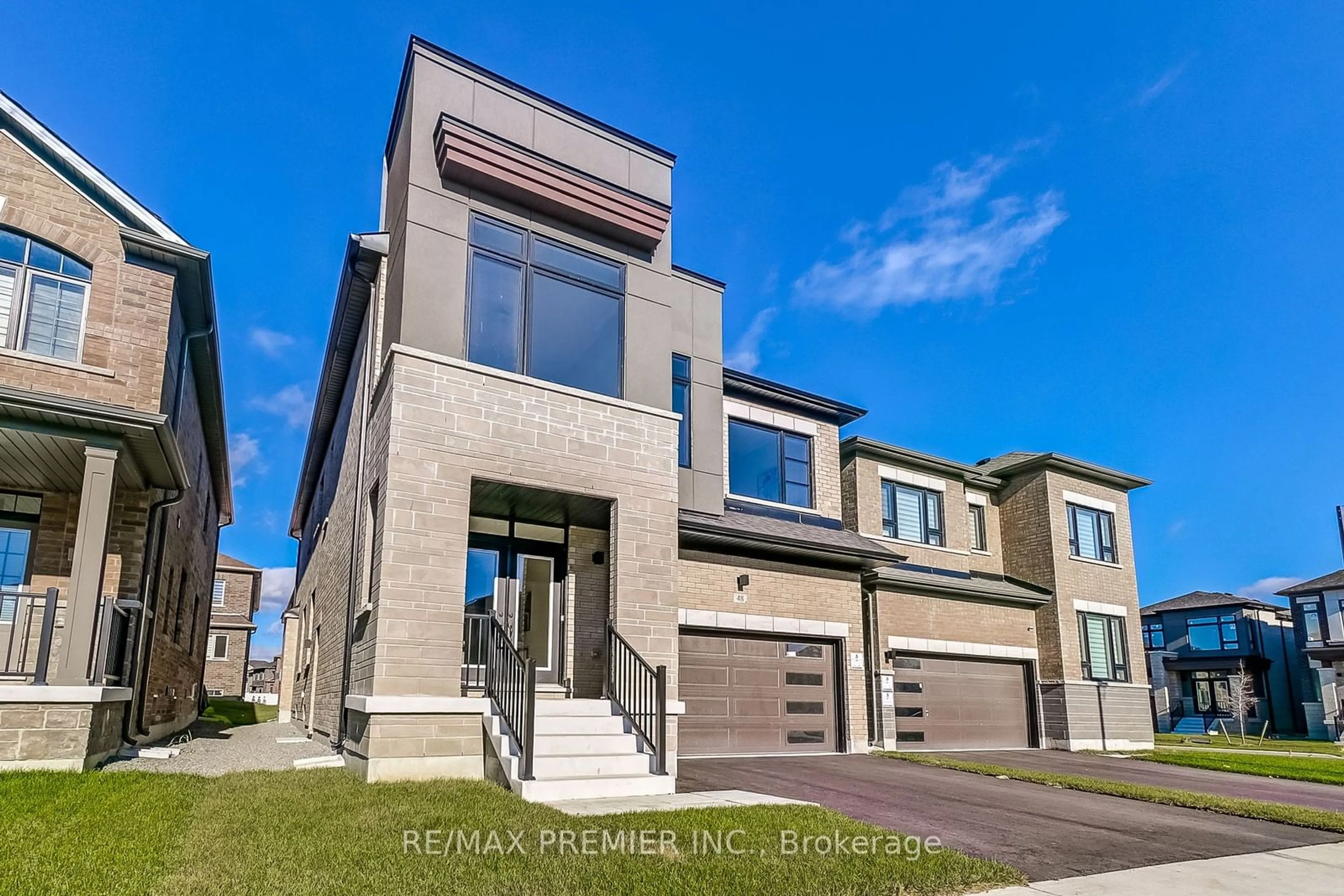 A pic from exterior of the house or condo, the front or back of building for 48 Sambro Lane, Whitchurch-Stouffville Ontario L4A 5E2