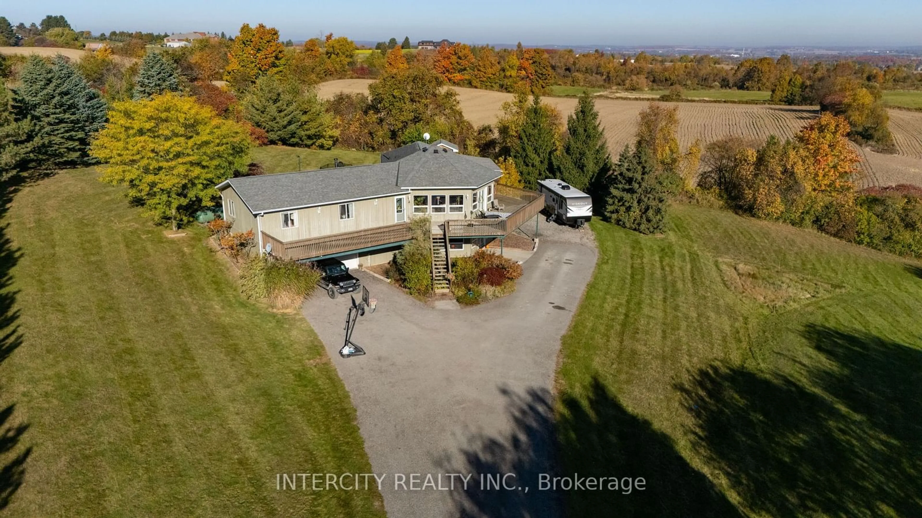 Frontside or backside of a home, the fenced backyard for 5800 17th Sideroad, King Ontario L0G 1T0