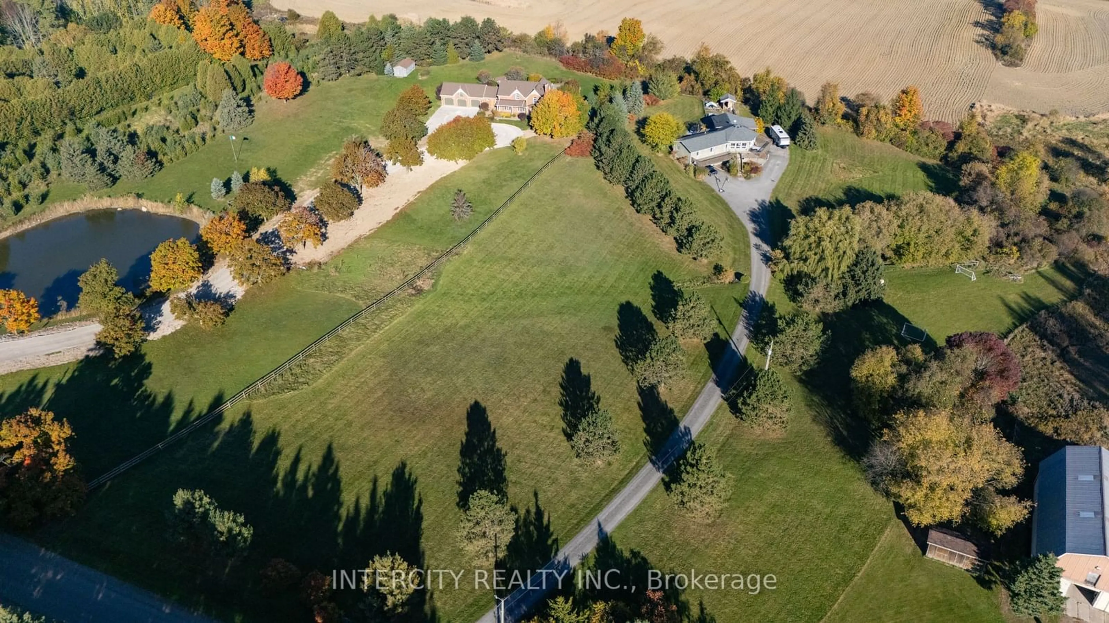 A pic from exterior of the house or condo, the fenced backyard for 5800 17th Sideroad, King Ontario L0G 1T0