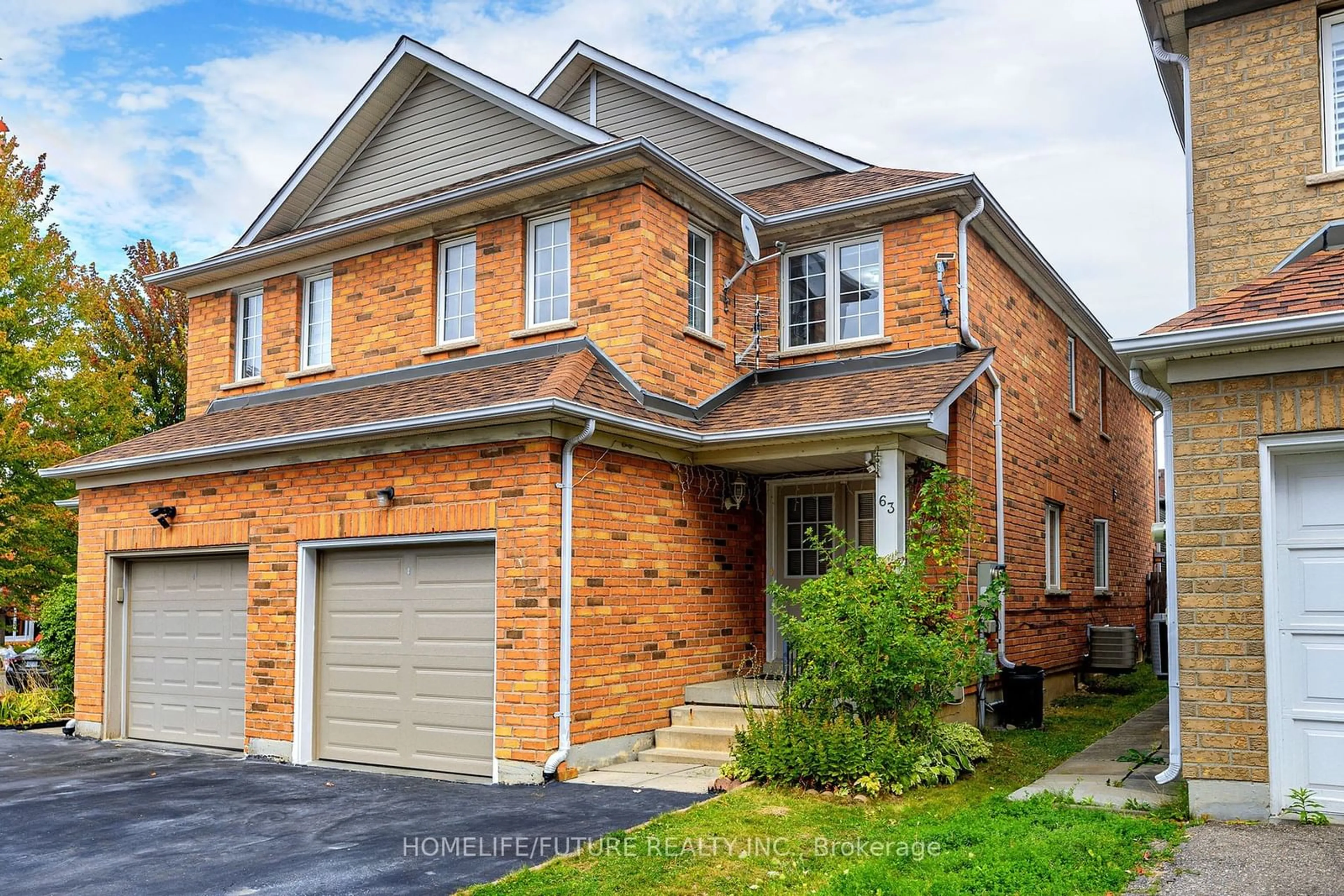 Home with brick exterior material for 63 Billingsley Cres, Markham Ontario L3S 4P2