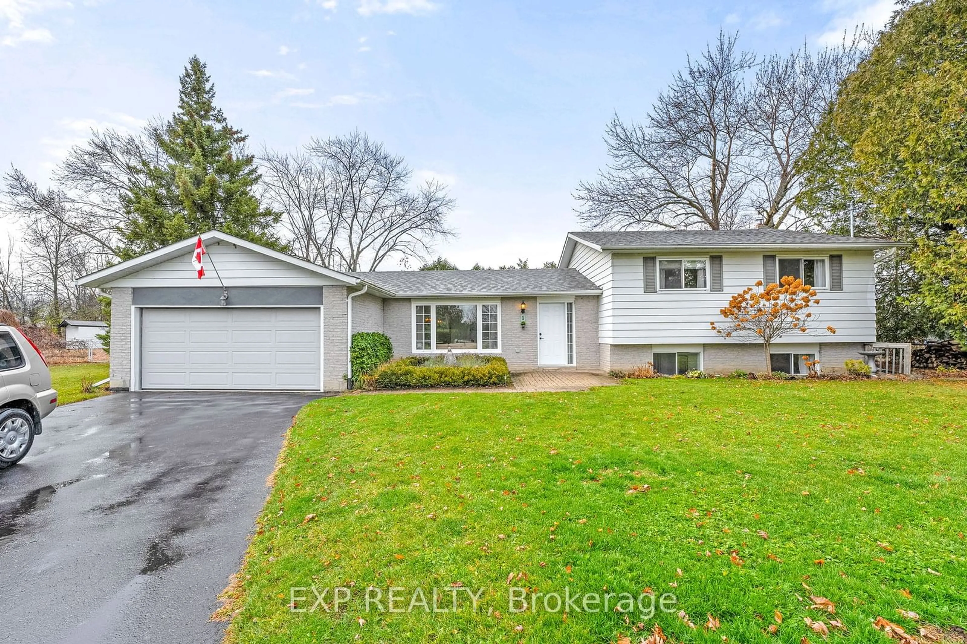 Frontside or backside of a home, the fenced backyard for 1 Northwood Rd, Georgina Ontario L0E 1R0