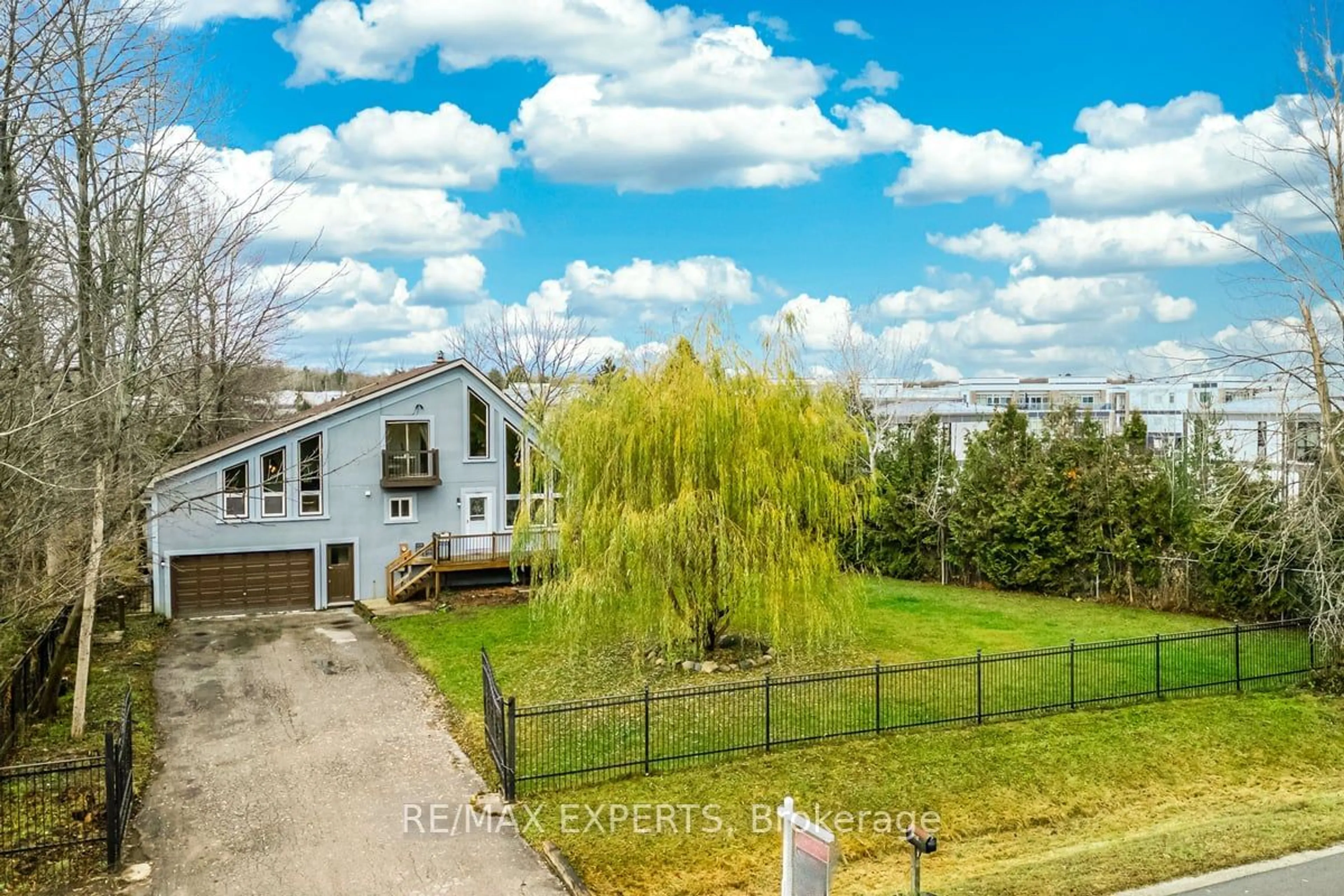 A pic from exterior of the house or condo, the fenced backyard for 3716 Maple Grove Rd, Innisfil Ontario L9S 3B3