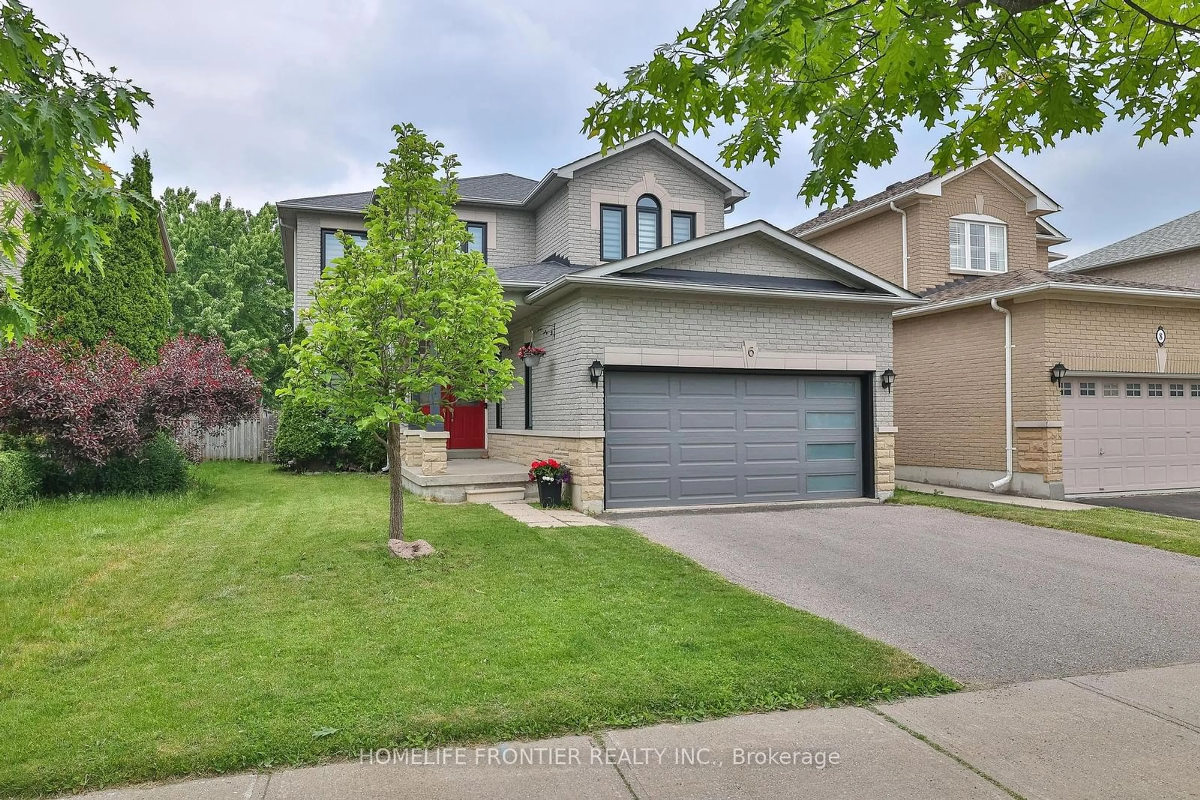 Frontside or backside of a home, the street view for 6 Raintree Cres, Richmond Hill Ontario L4E 3T5