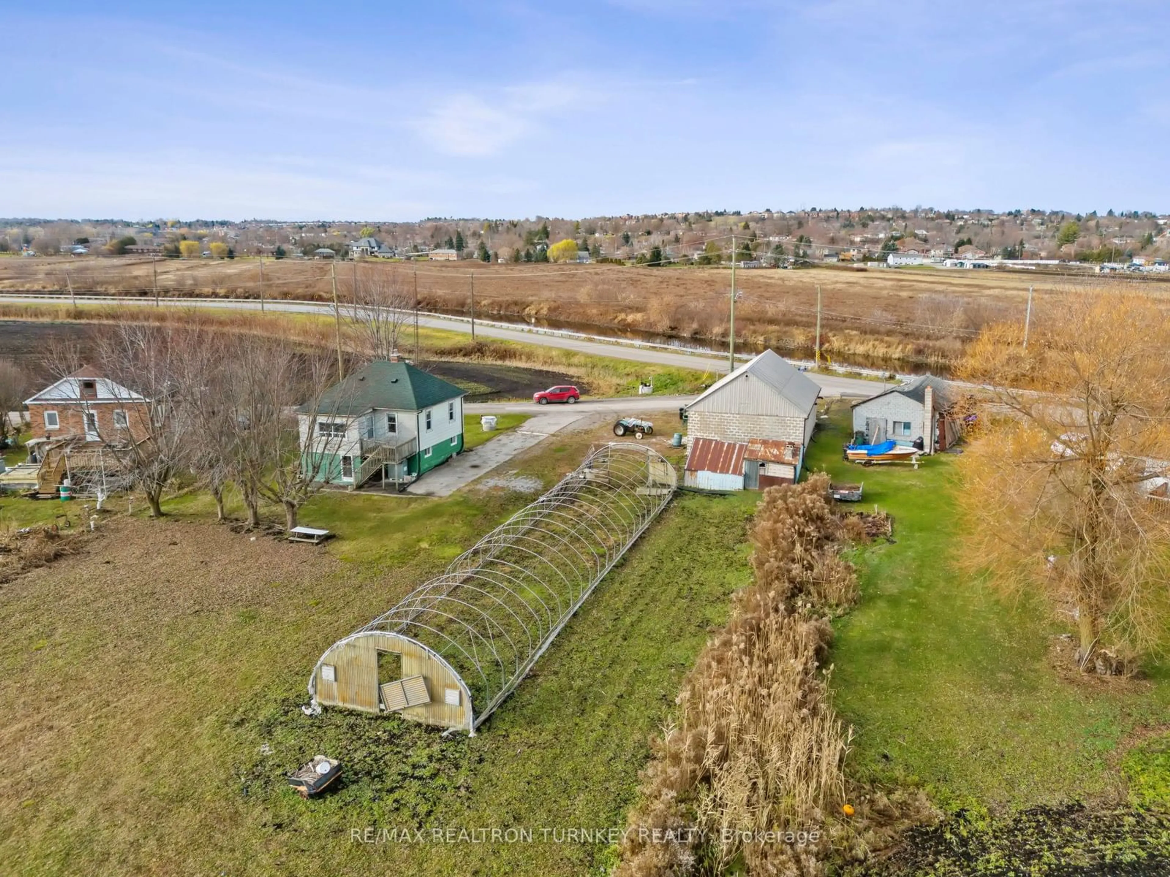 A pic from exterior of the house or condo, the fenced backyard for 3 Grencer Rd, Bradford West Gwillimbury Ontario L3Z 3Z2