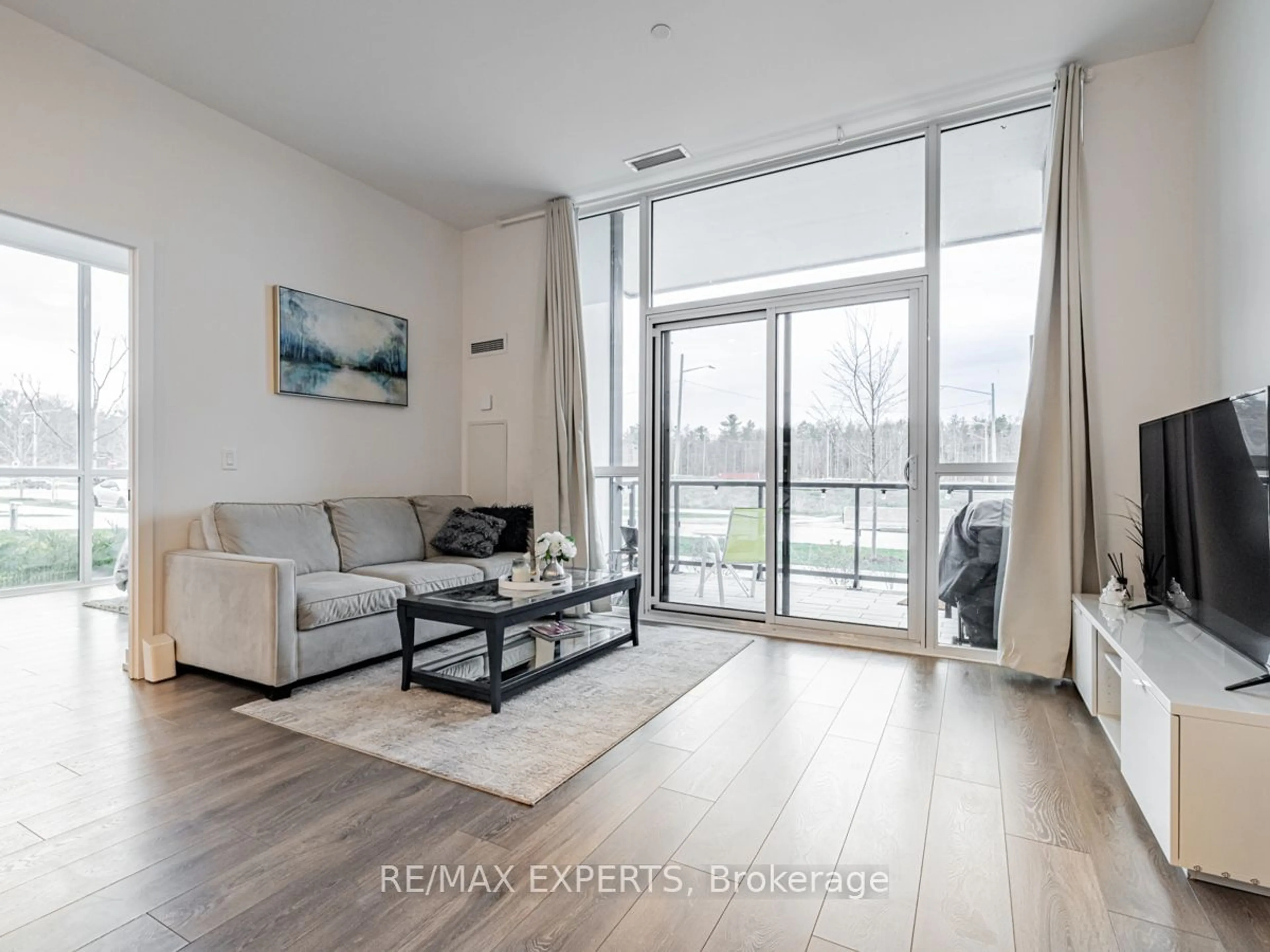 Living room, wood floors for 415 Sea Ray Ave #105, Innisfil Ontario L9S 0R5